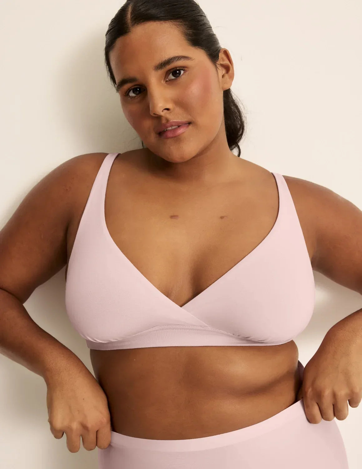 Front view of model wearing the SweetDreams Nursing Bra, highlighting the neckline, strap design, and silhouette – Rose Water – view 2 of 11