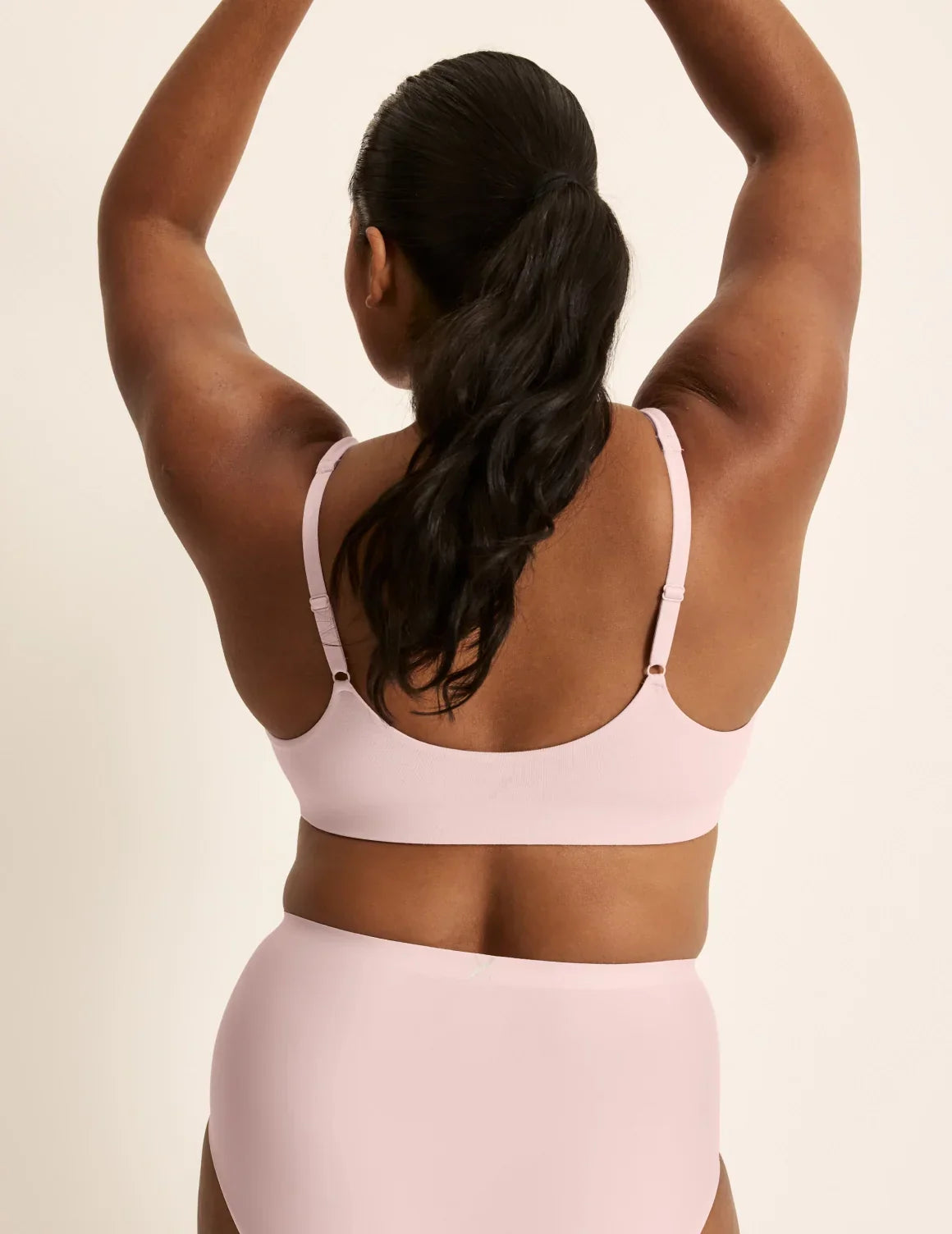 Back view of model wearing the SweetDreams Nursing Bra, highlighting the neckline, strap design, and silhouette – Rose Water – view 6 of 11