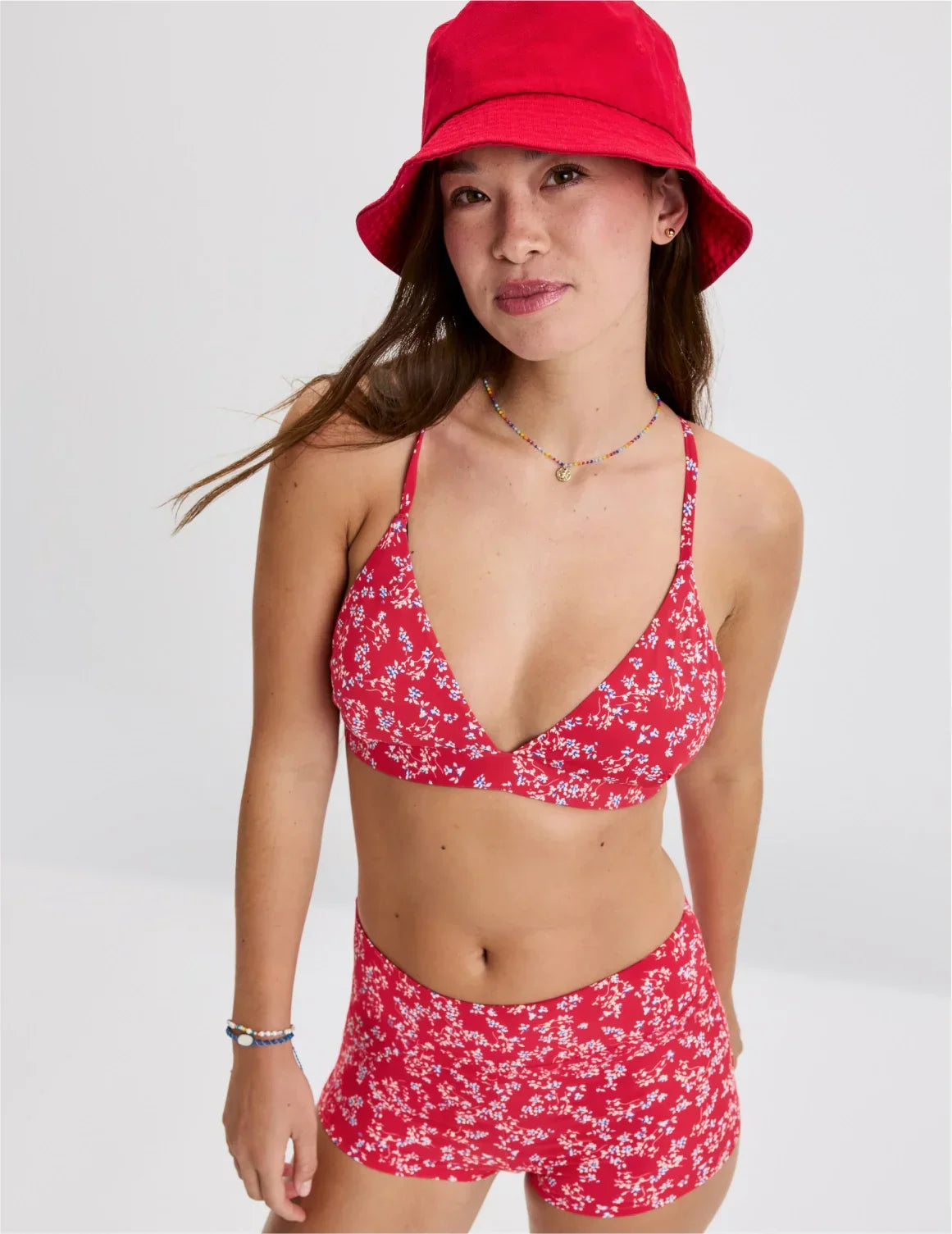 Front view of model wearing the Teen Triangle Bikini Top highlighting the neckline, strap design and fit – Poppy Petal – view 3 of 48