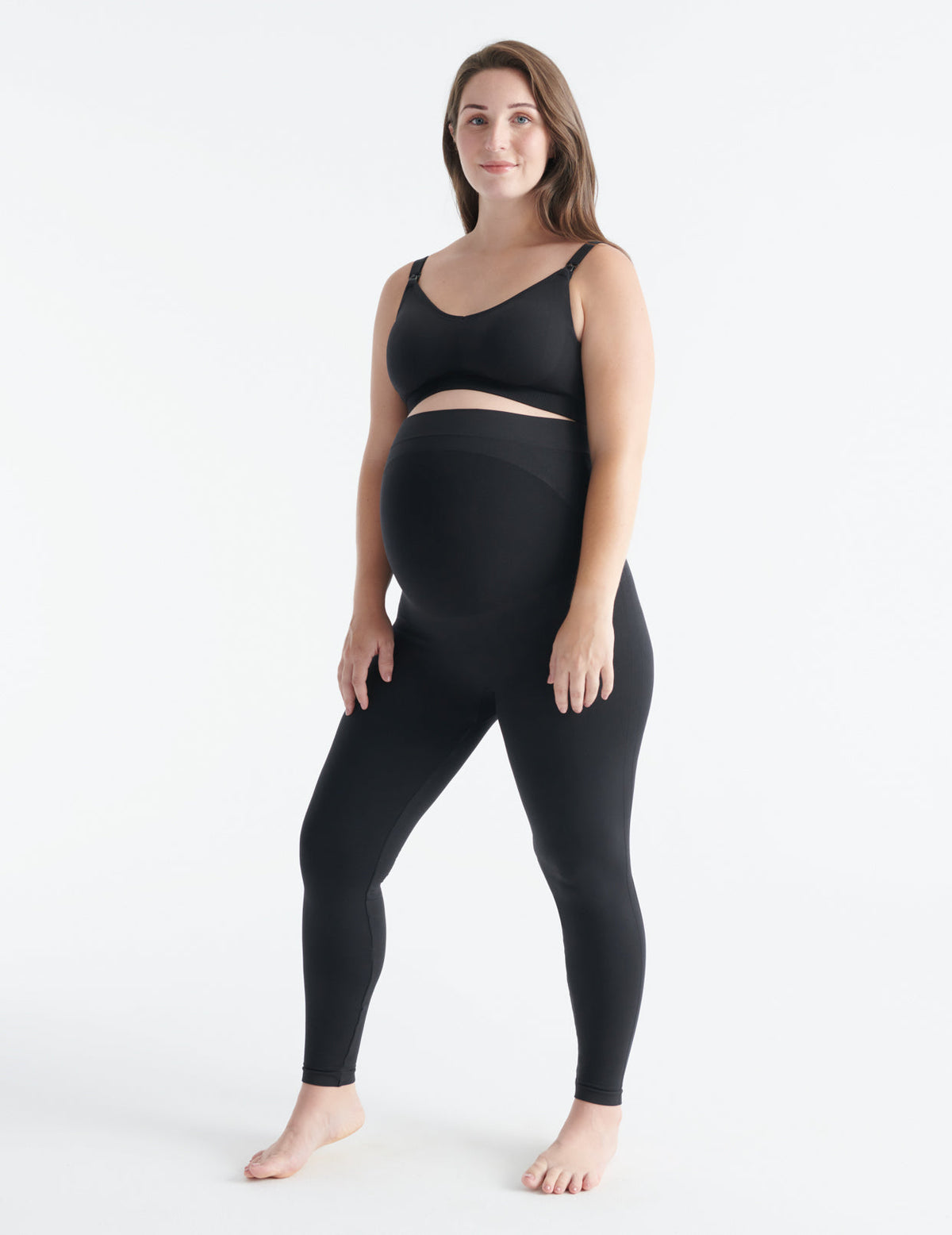 Front view of model wearing the BlissFit™ Maternity Legging highlighting the coverage & fit – Black – view 1 of 7