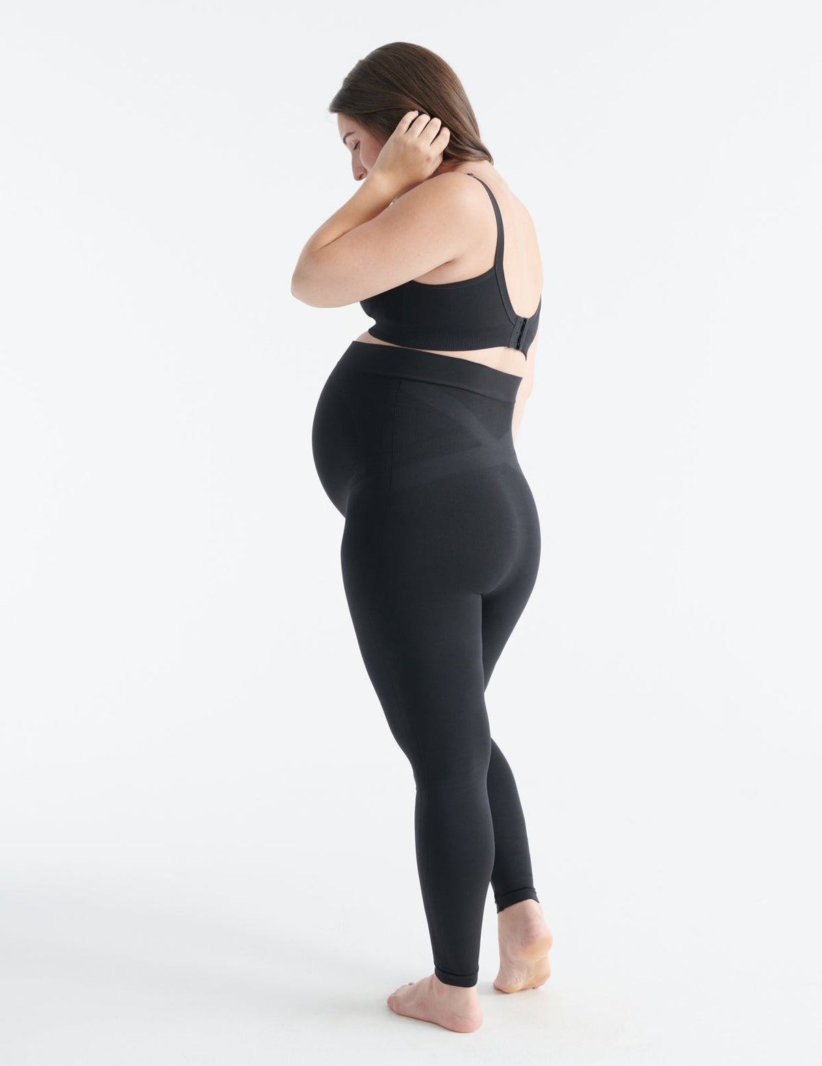 Front view of model wearing the BlissFit™ Maternity Legging highlighting the coverage & fit – Black – view 5 of 7