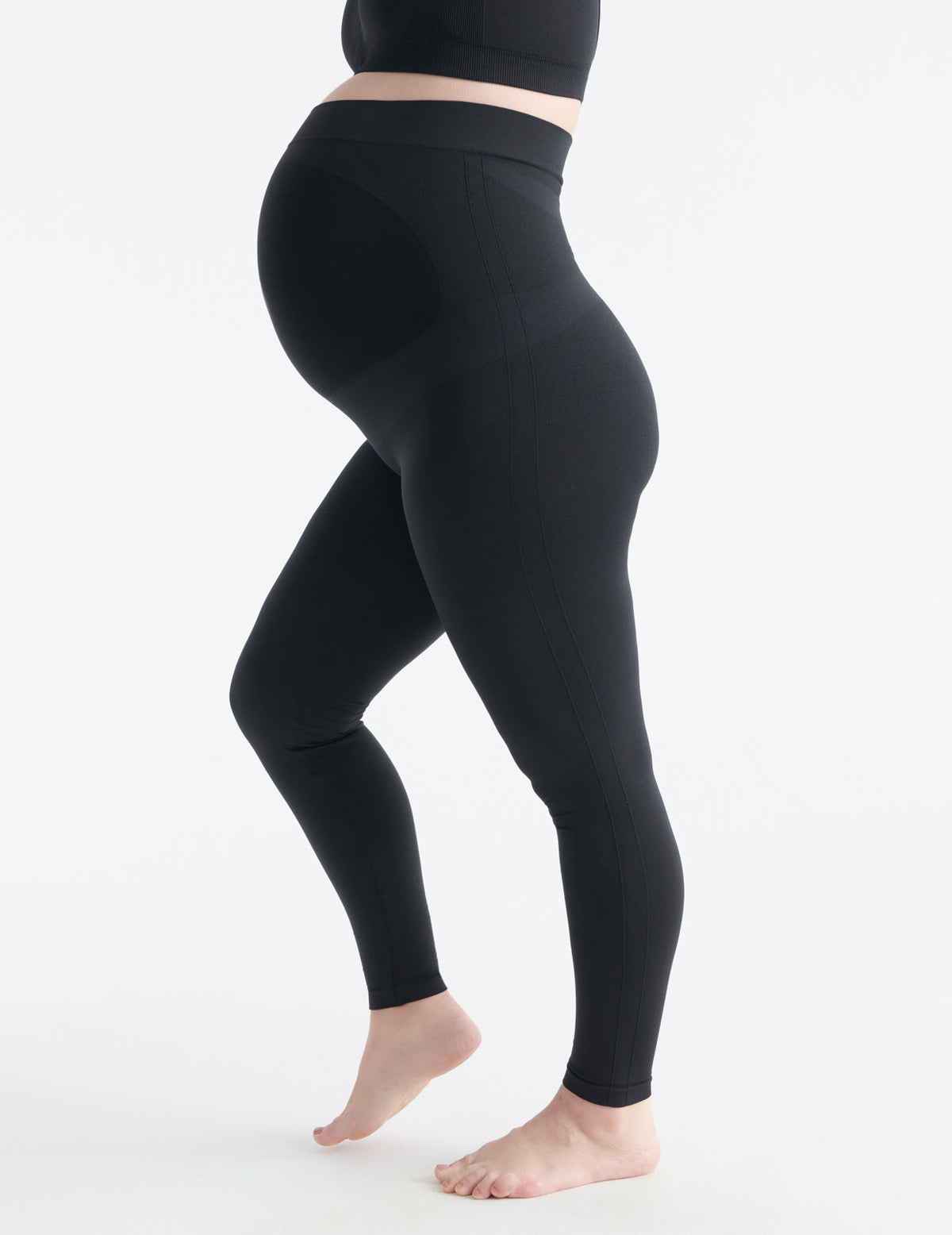 Front view of model wearing the BlissFit™ Maternity Legging highlighting the coverage & fit – Black – view 6 of 7