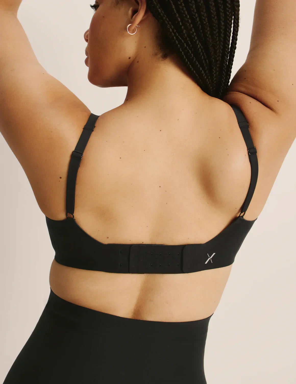 Back view of model wearing the 2-Hook Band Extender – Black – view 1 of 9