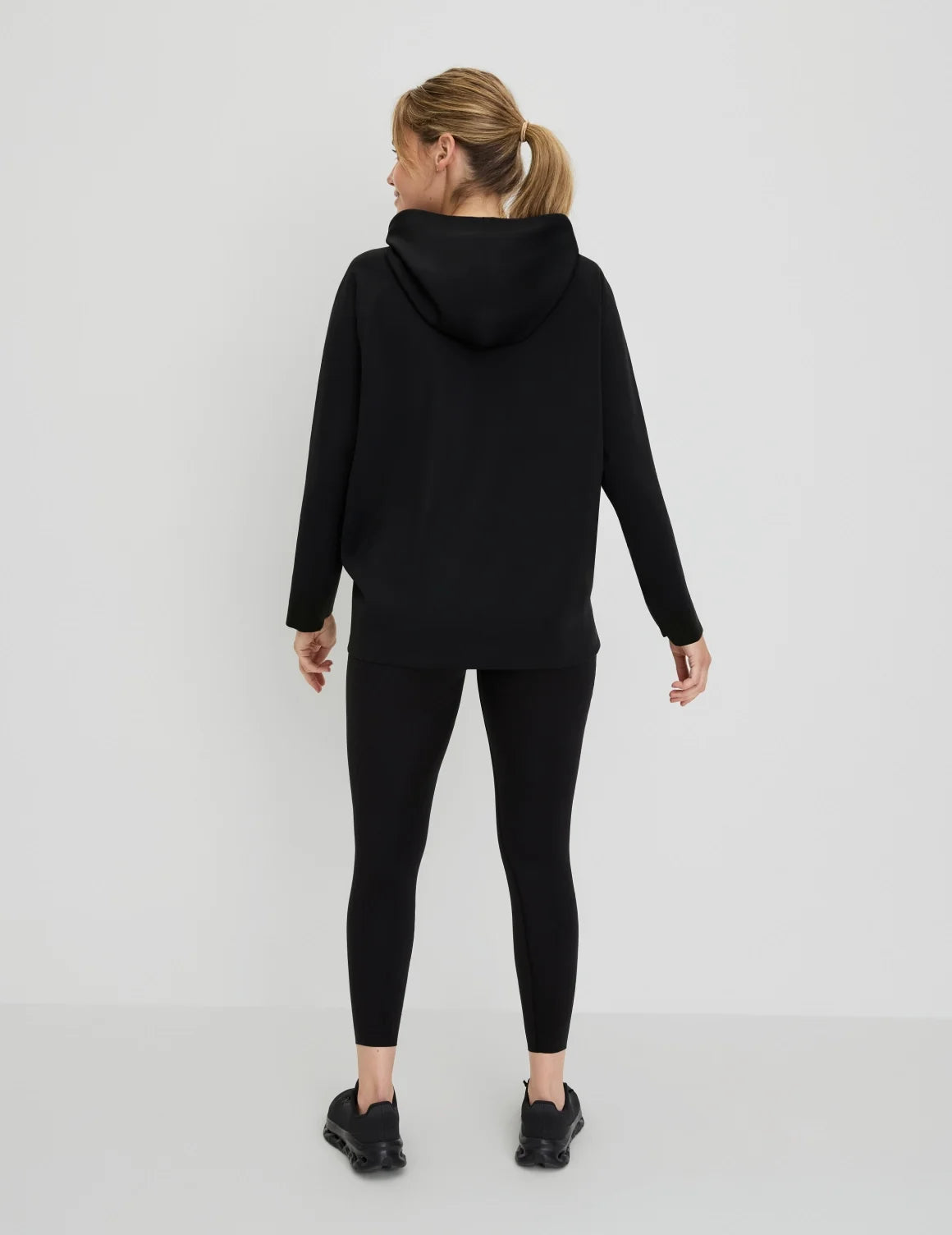 Back view of model wearing the CloudCut™ Hoodie highlighting the coverage and fit – Black – view 3 of 15