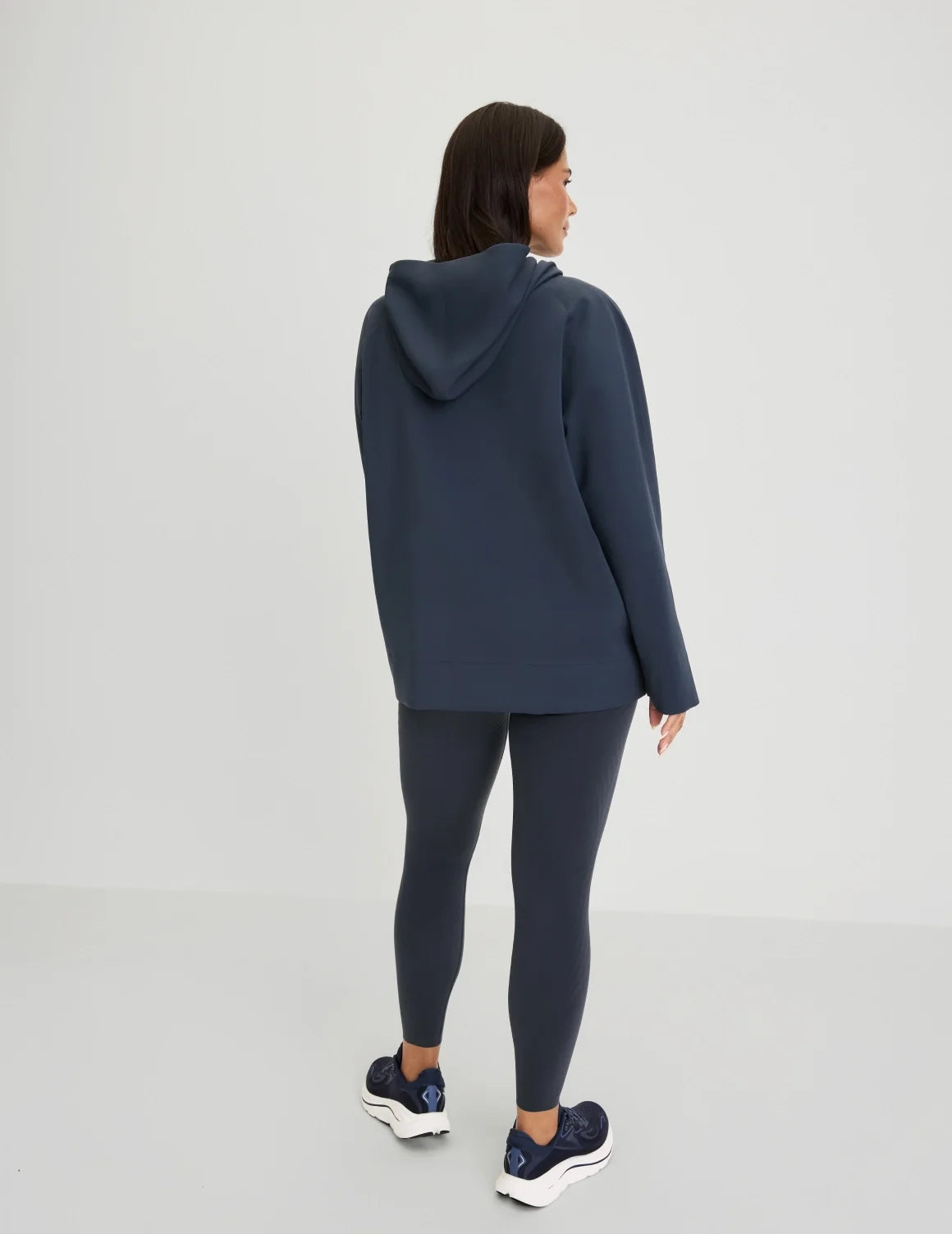 Back view of model wearing the CloudCut™ Hoodie highlighting the coverage and fit – Twilight Navy – view 6 of 15