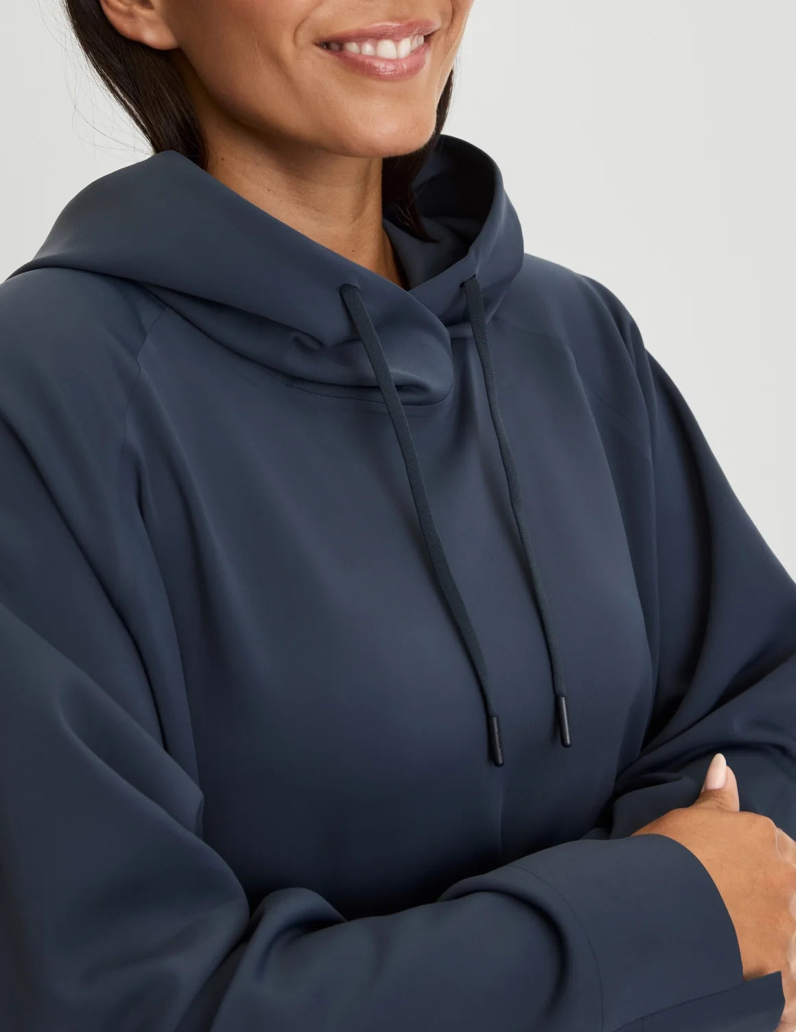 Front view of model wearing the CloudCut™ Hoodie highlighting the coverage and fit – Twilight Navy – view 12 of 15