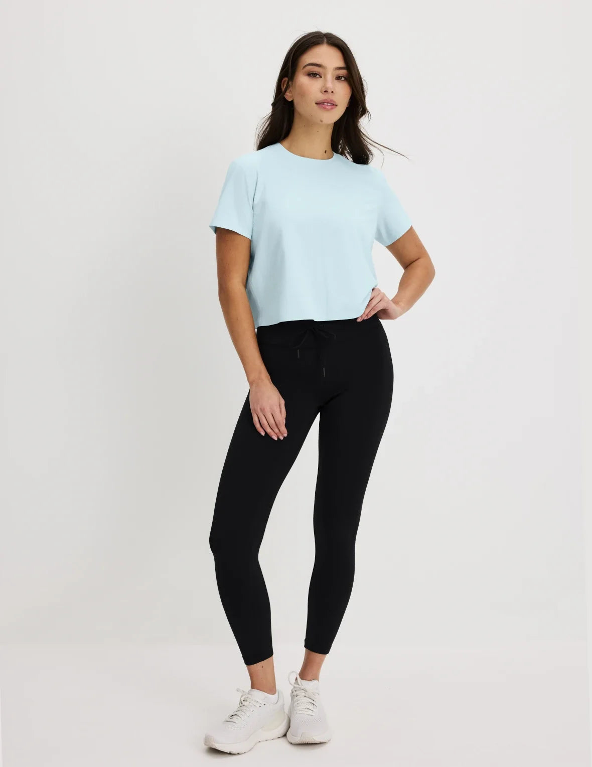 Front view of model wearing the CloudCut™ Legging highlighting the coverage and fit – Black – view 1 of 14