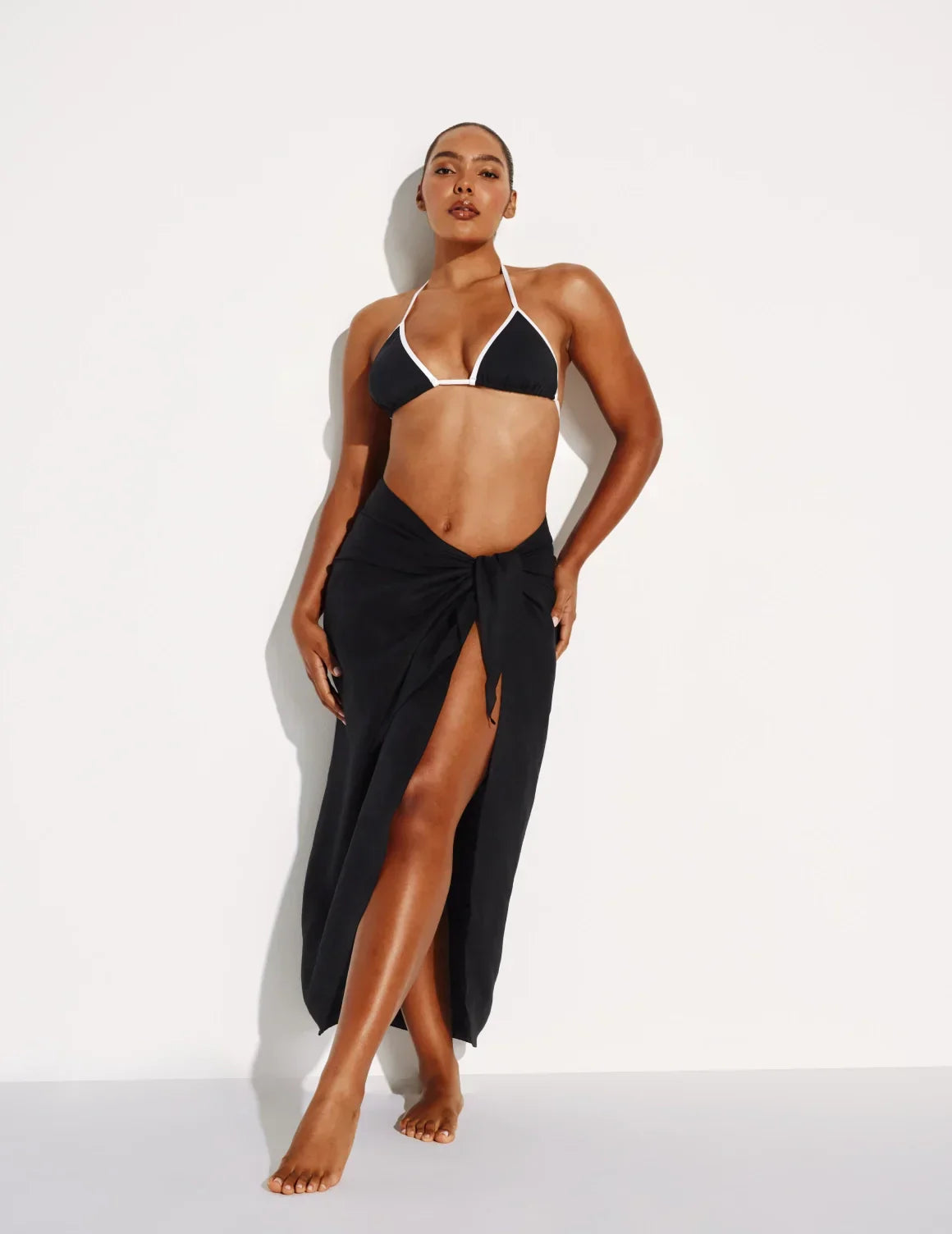 Front view of model wearing the Crinkle Linen Sarong highlighting the coverage and fit – Black – view 1 of 13
