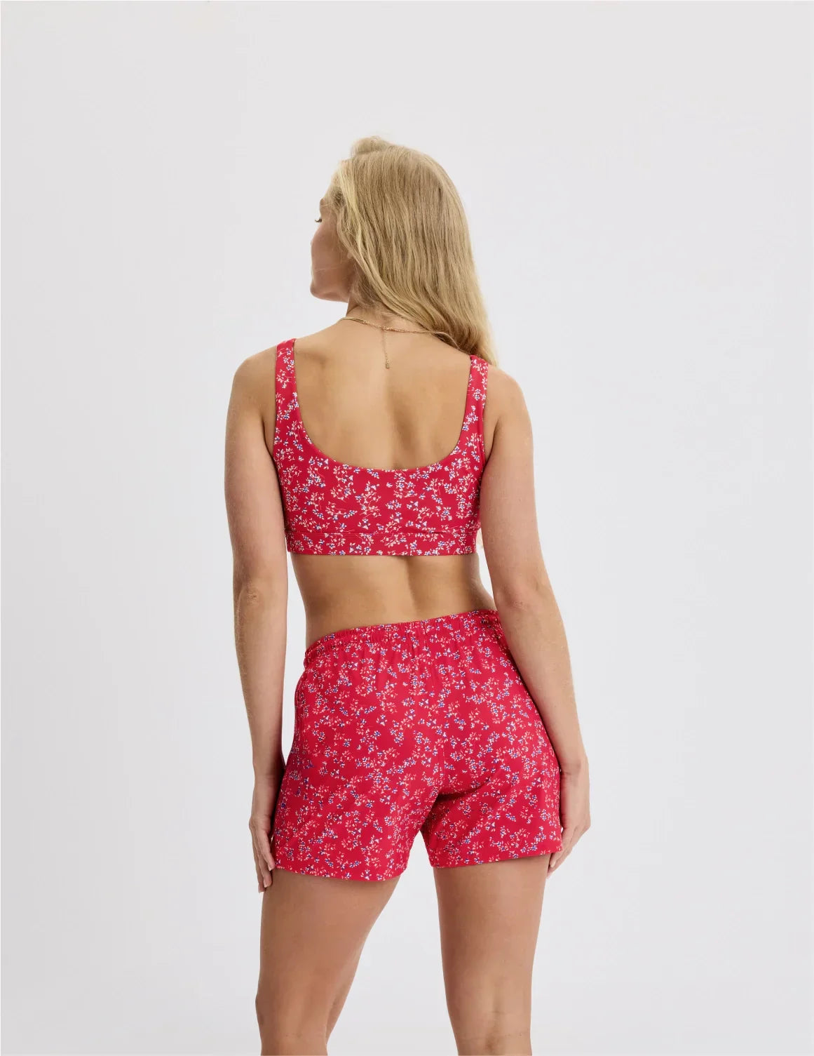 Back view of model wearing the Teen Double Scoop Bikini Top highlighting the neckline, strap design, and silhouette – Poppy Petal – view 10 of 62