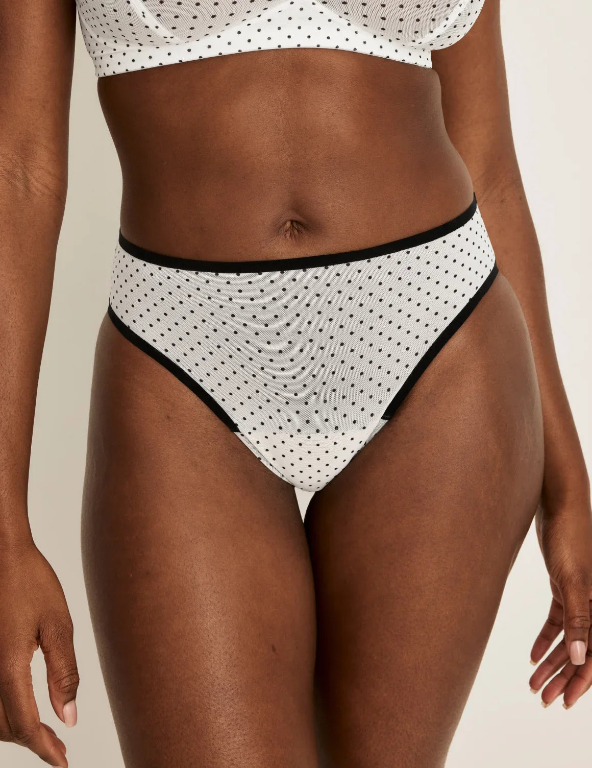 Front view of model wearing the Essential Full Mesh French Cut highlighting the coverage and smooth fit – White with Black Polka Dot – view 1 of 13