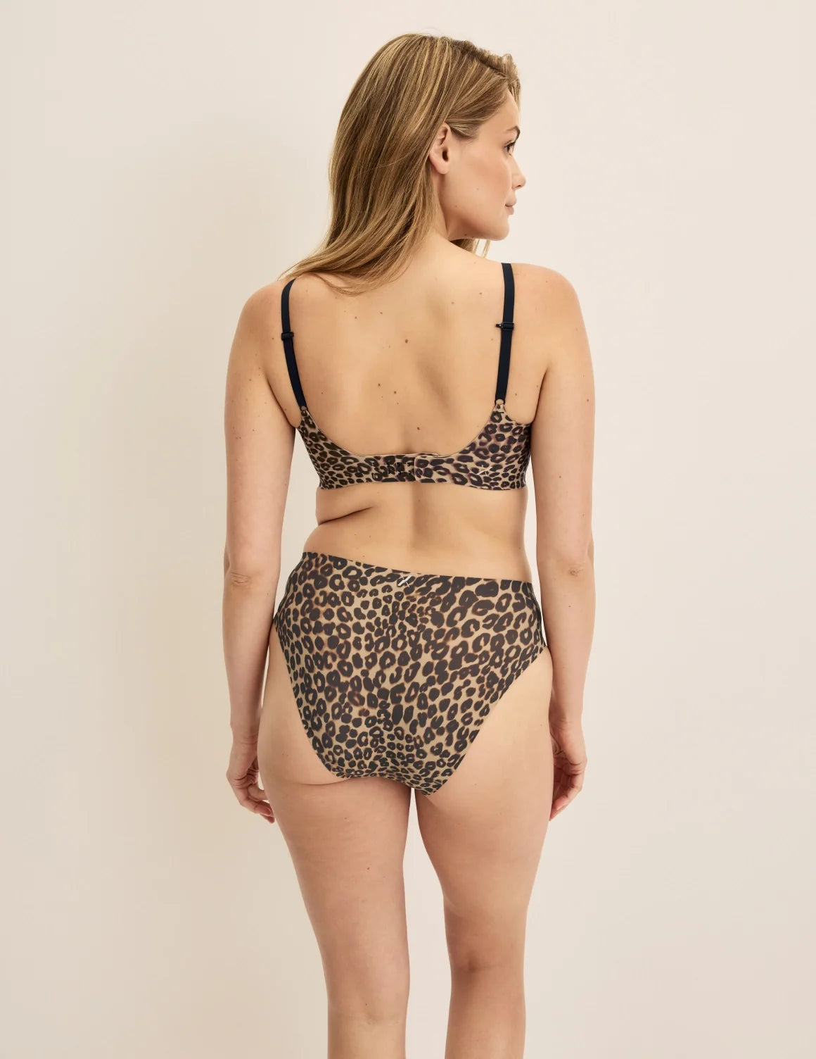 Back view of model wearing the Essential No-Show French Cut highlighting the coverage and smooth fit – Cheetah Print – view 8 of 30