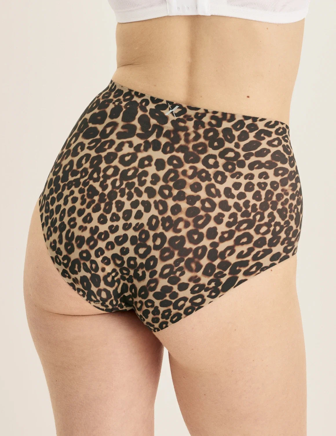 Back view of model wearing the Essential No-Show High Rise highlighting the coverage and smooth fit – Cheetah Print – view 3 of 32