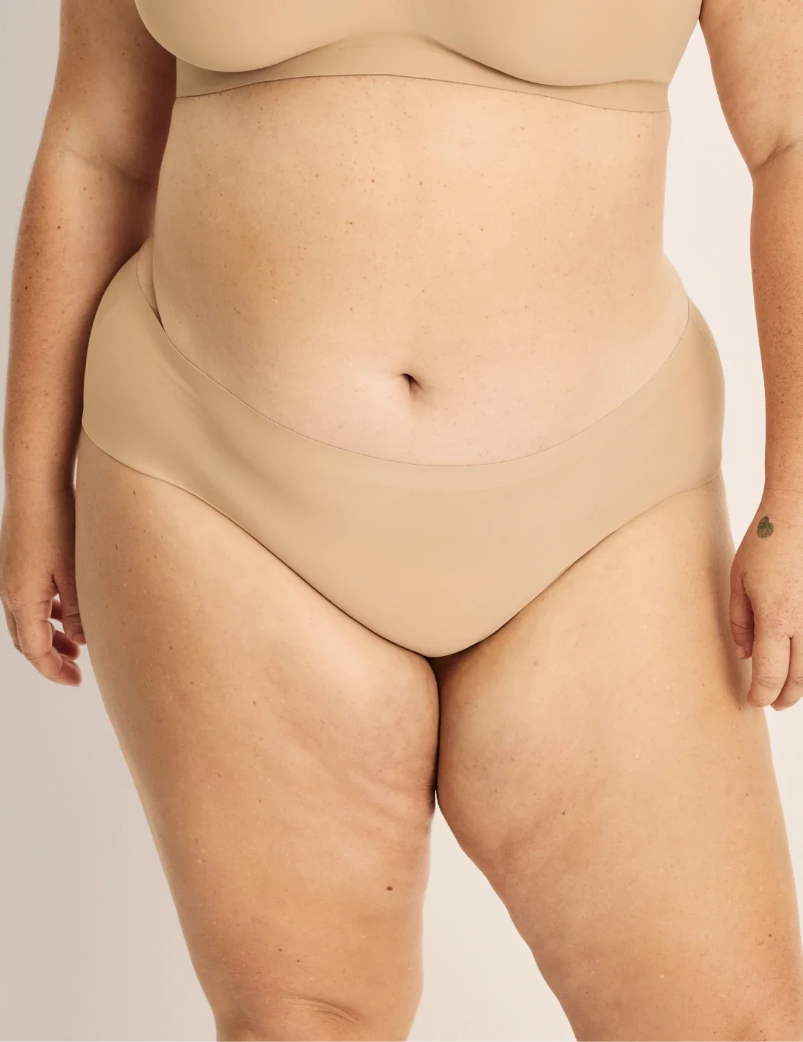 Front view of model wearing the Essential No-Show Boyshort highlighting the coverage and smooth fit – Warm Sand – view 12 of 27
