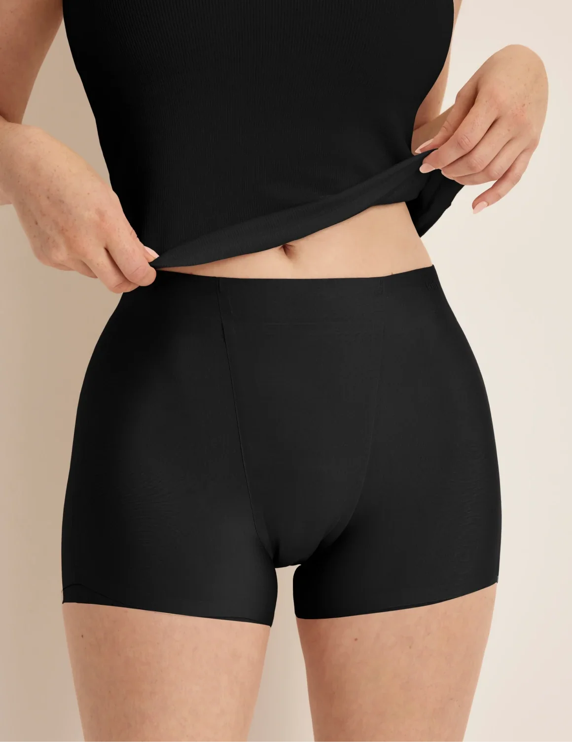 Front view of model wearing the SuperPlus Leakproof® Dream Short highlighting the coverage and smooth fit – Black – view 2 of 36