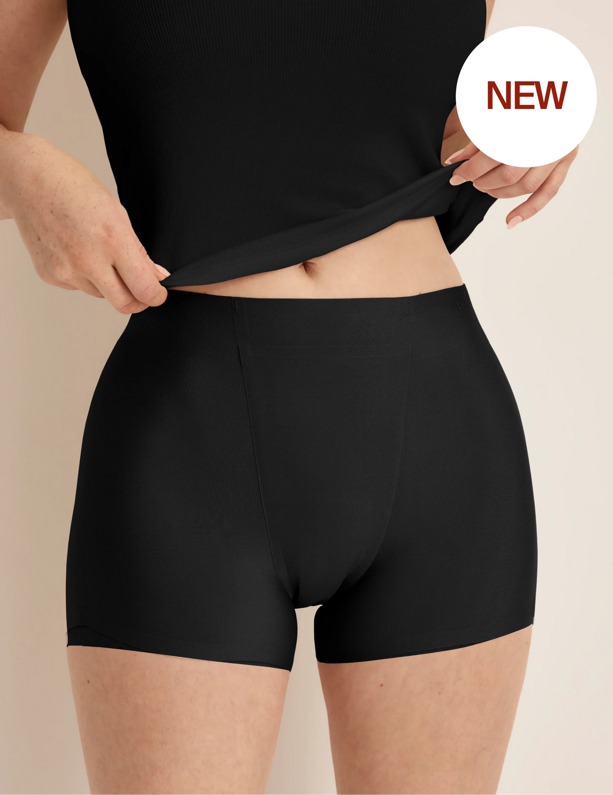 Front view of model wearing the SuperPlus Leakproof® Dream Short highlighting the coverage and smooth fit – Black – view 1 of 36