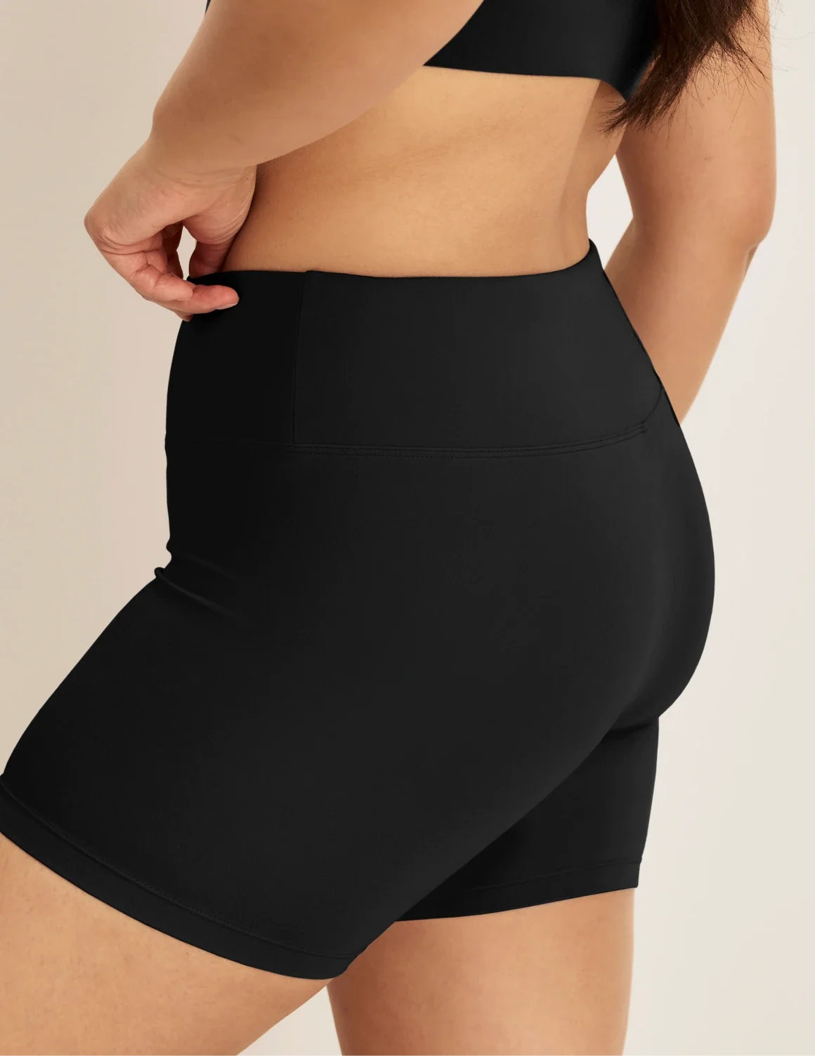 Side view of model wearing the Modal Ultra Soft Shorts highlighting the coverage and fit – Black – view 4 of 20
