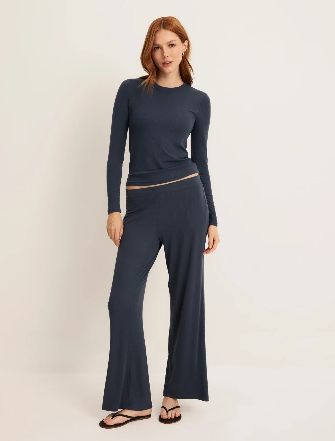 Front view of model wearing the Modal Rib Pant highlighting the coverage and fit – Twilight Navy – view 9 of 13