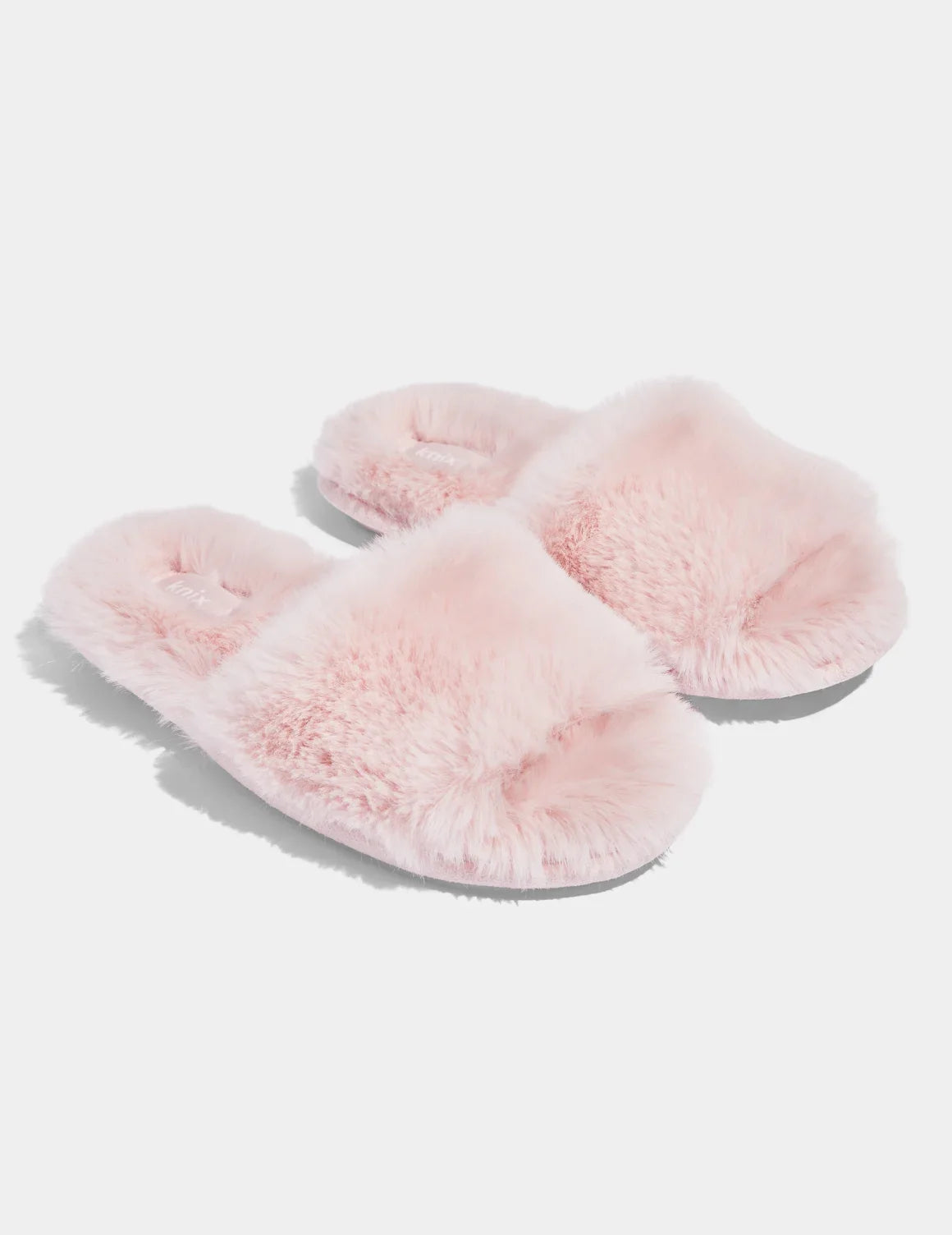 Pair of Fuzzy Slippers shown front-facing against a light gray background – Soft Pink – view 3 of 4