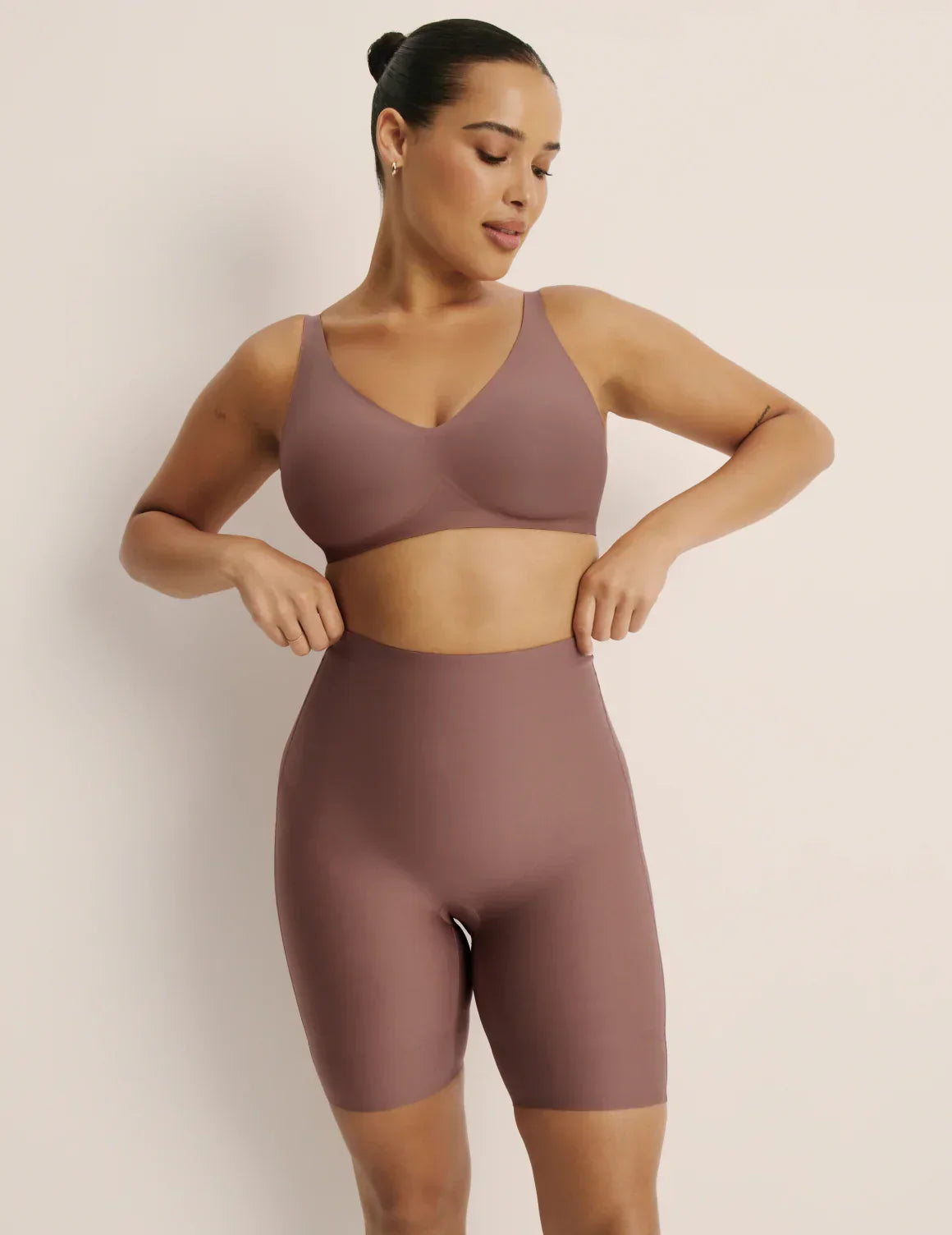 Front view of model wearing the Customizable Shaper High Rise Shorts, highlighting the coverage and smooth fit – Sola – view 2 of 15