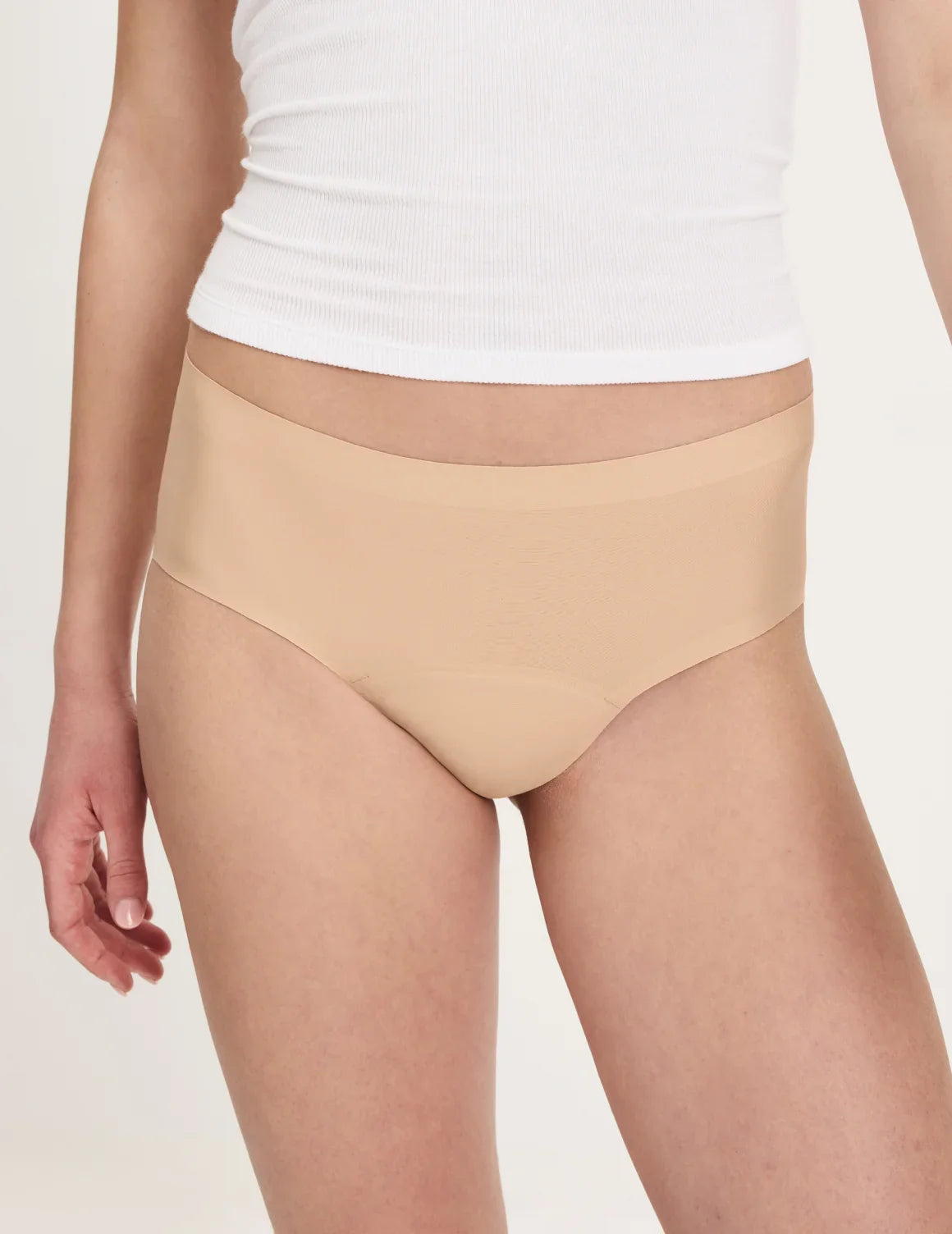 Front view of model wearing the Teen Super Leakproof® No-Show Boyshort highlighting the coverage and smooth fit – Warm Sand – view 11 of 48