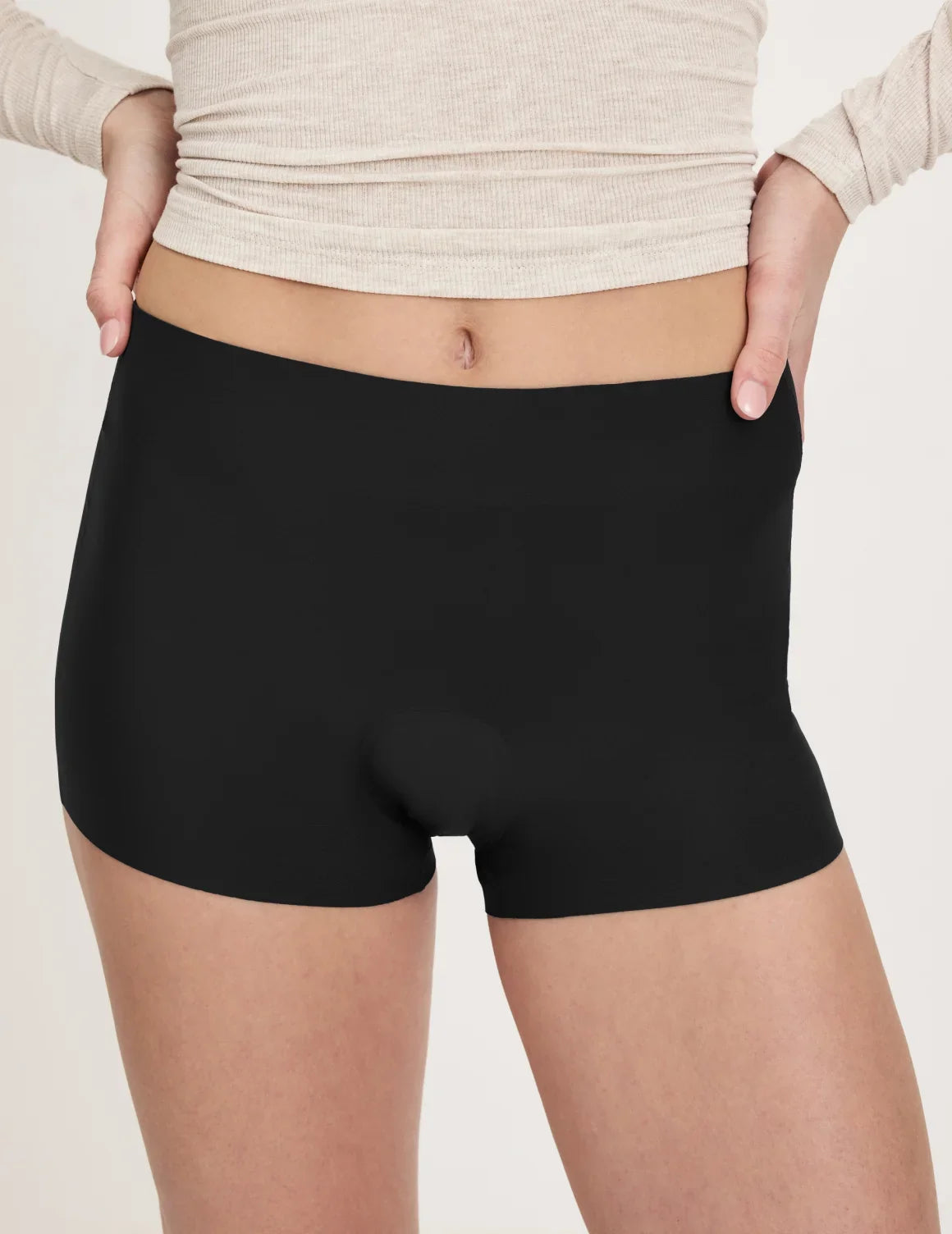 Front view of model wearing the Teen Super Leakproof® Sleepover Short highlighting the coverage and smooth fit – Black – view 3 of 36
