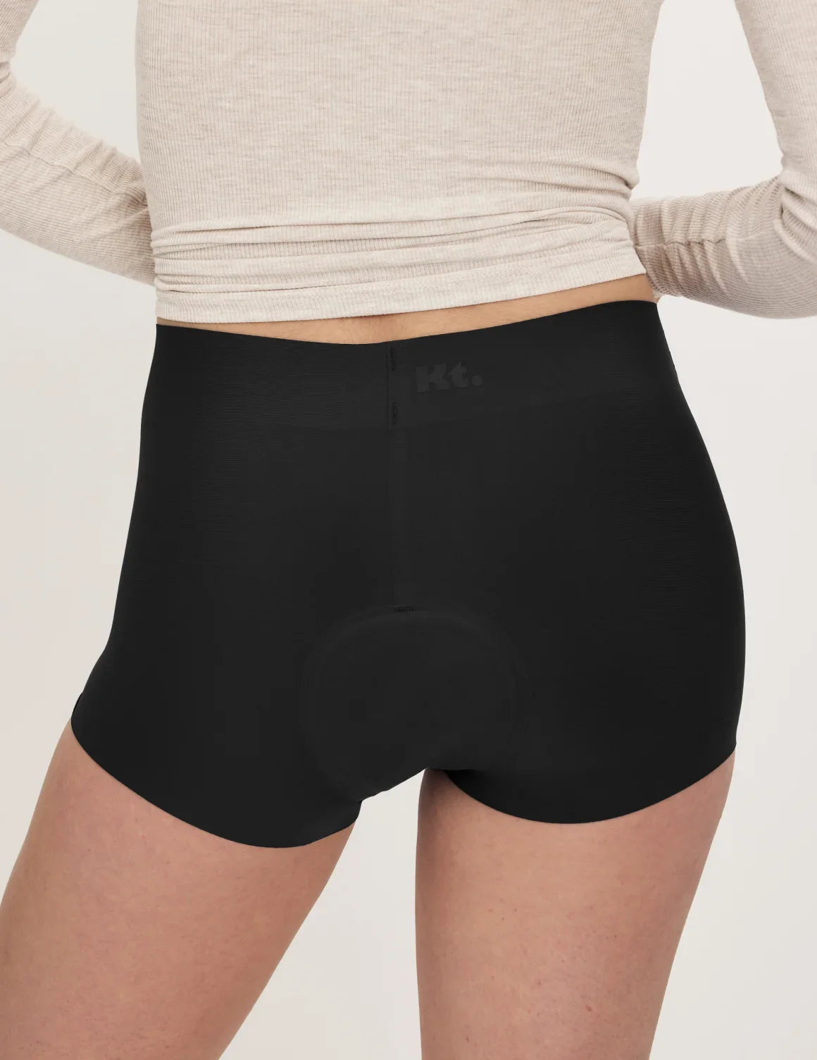 Back view of model wearing the Teen Super Leakproof® Sleepover Short highlighting the coverage and smooth fit – Black – view 4 of 36