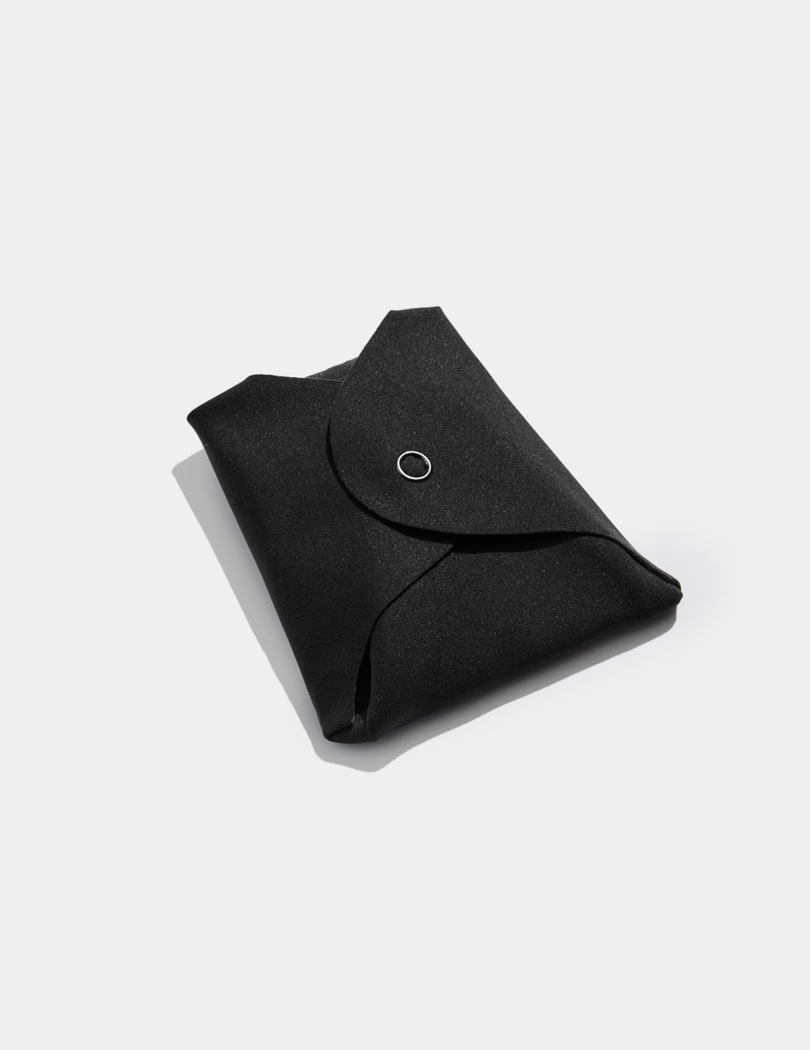 Super Leakproof® Reusable Snap Pads shown front-facing against a light gray background – Black – view 2 of 5