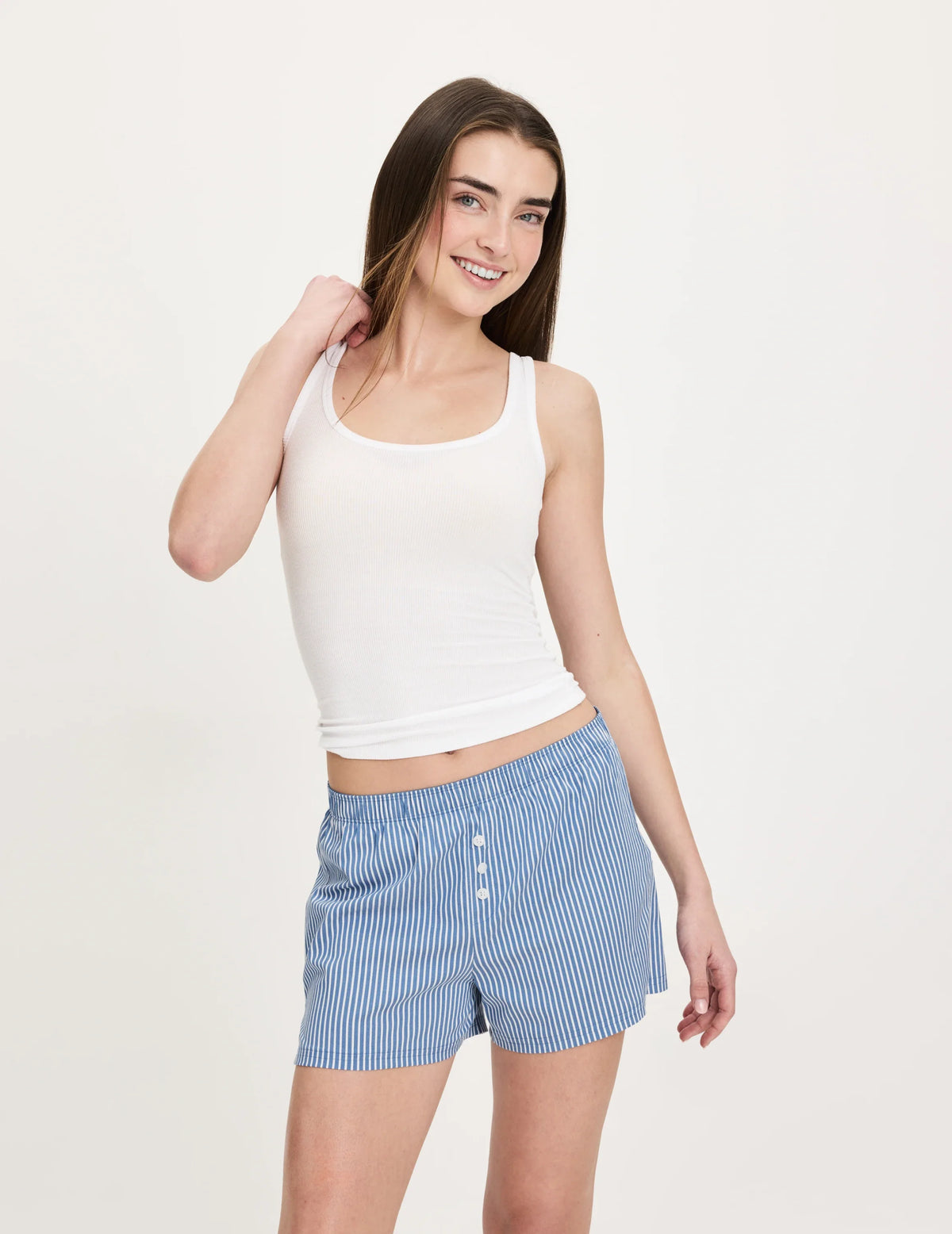 Front view of model wearing the Teen Super Leakproof® Sleepover Boxer highlighting the coverage and fit – Blue Stripe – view 2 of 39