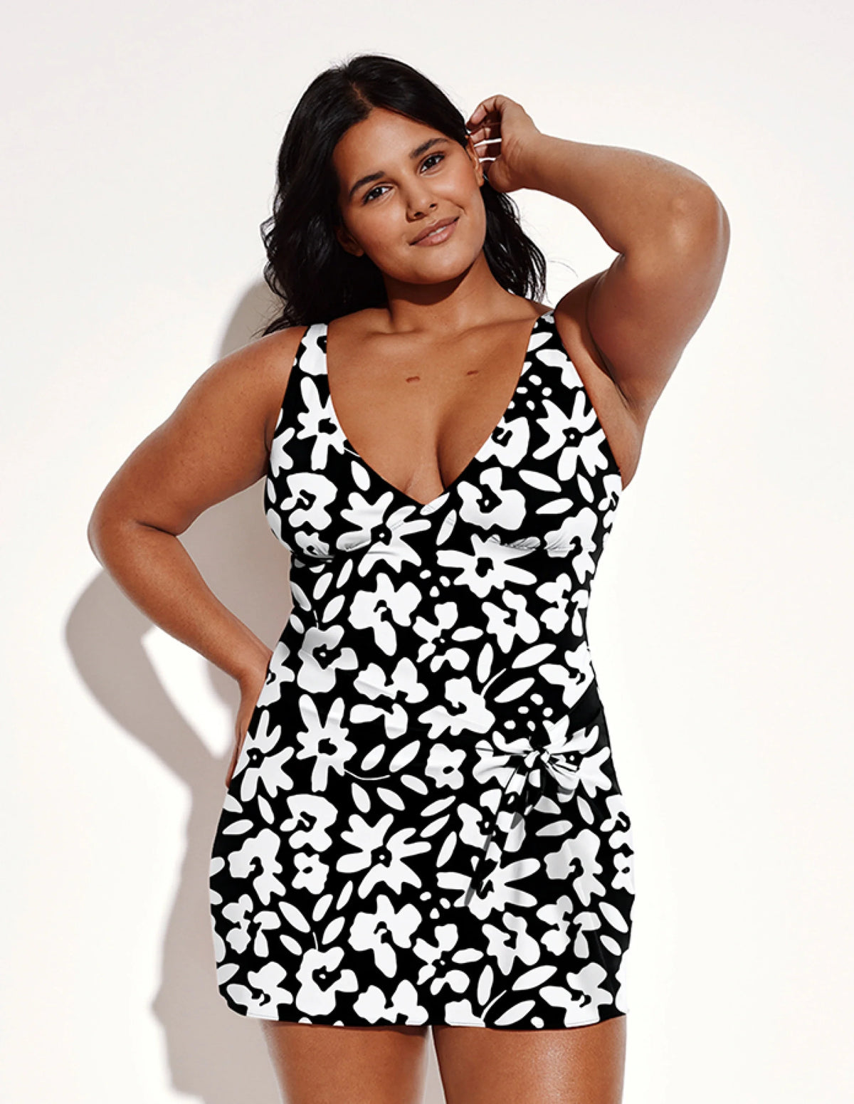 Front view of model wearing the Leakproof Sculpt Deep V Swim Dress highlighting the coverage and fit – Jasmine Dusk – view 8 of 12
