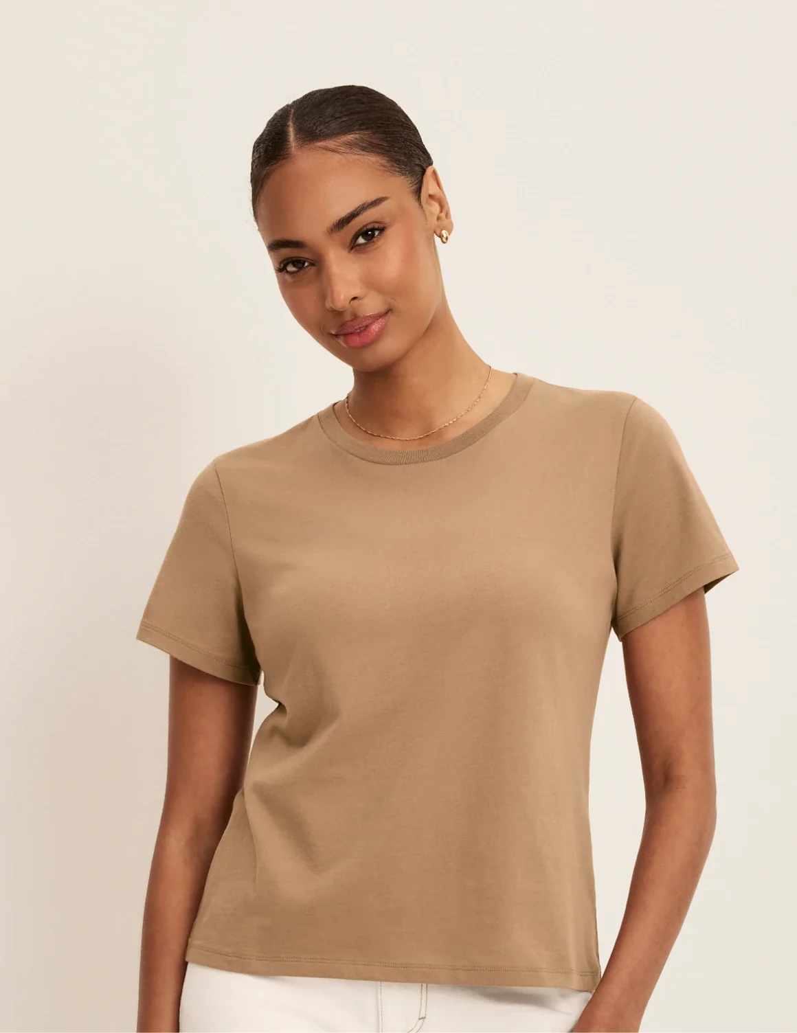 Front view of model wearing the Cotton Relaxed T-Shirt highlighting the coverage and fit – Cashew – view 1 of 20