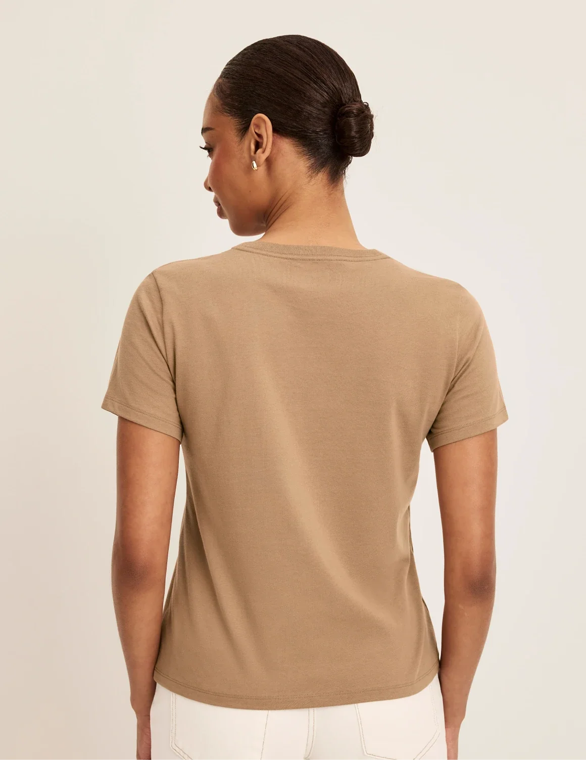Back view of model wearing the Cotton Relaxed T-Shirt highlighting the coverage and fit – Cashew – view 3 of 20