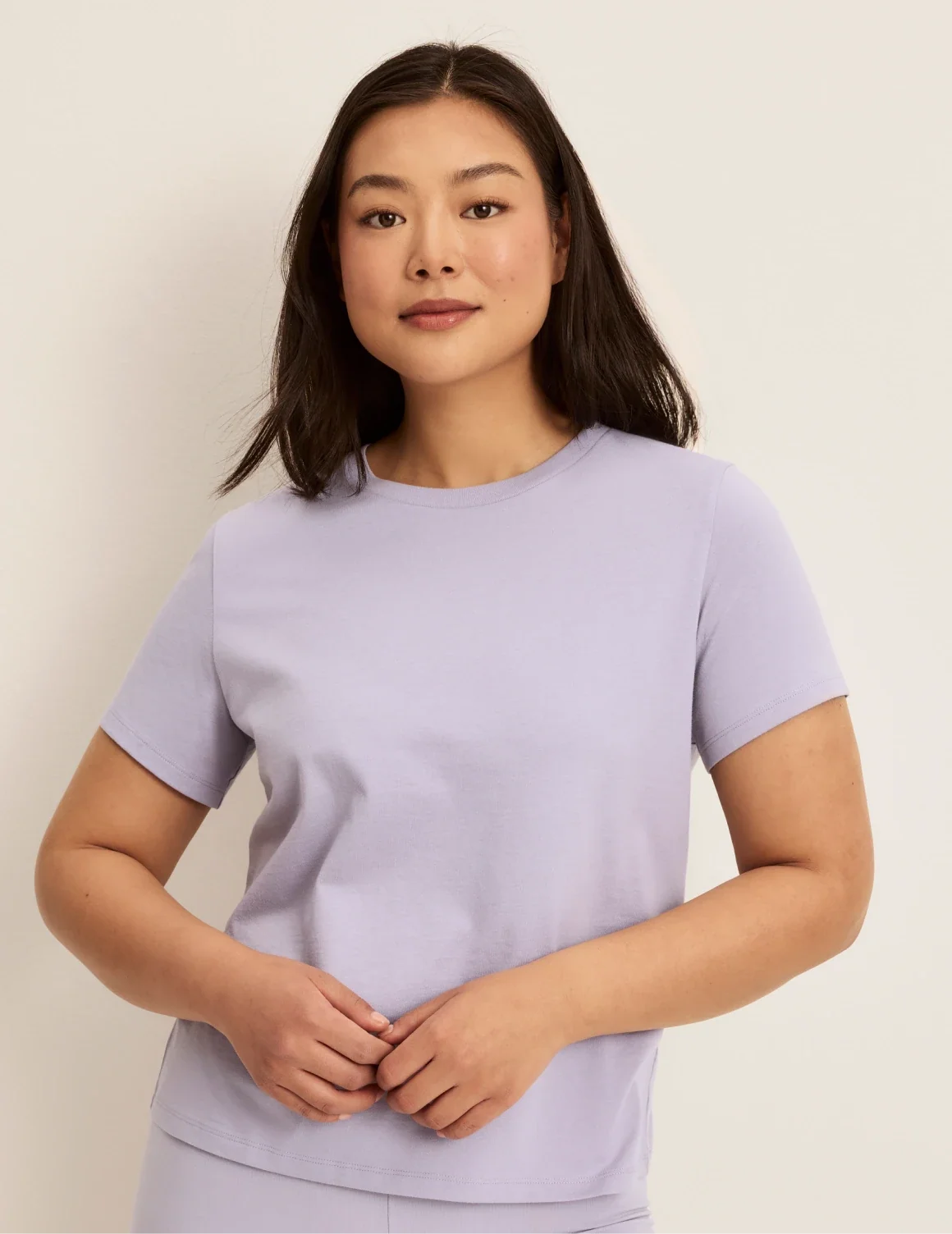 Front view of model wearing the Cotton Relaxed T-Shirt highlighting the coverage and fit – Lavender – view 11 of 20