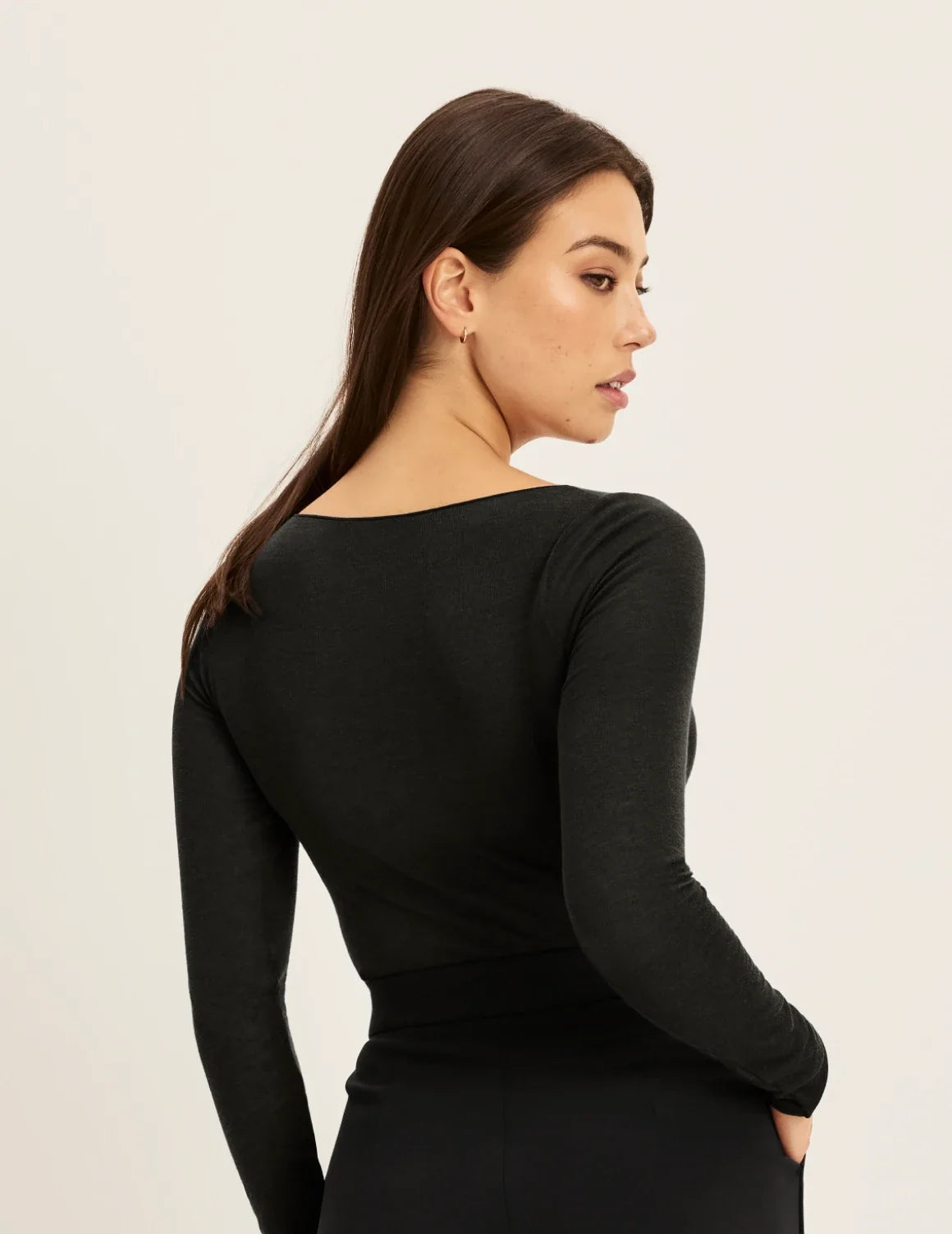 Back view of model wearing the Cashmere Mist Boatneck Top highlighting the neckline and fit – Black – view 3 of 17