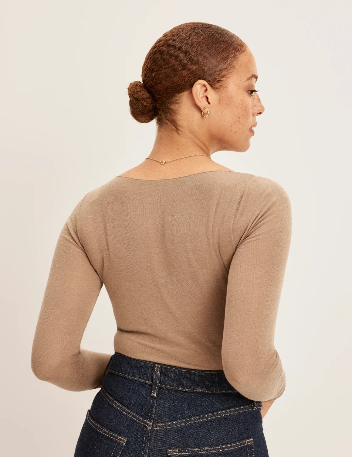 Back view of model wearing the Cashmere Mist Boatneck Top highlighting the neckline and fit – Cashew – view 6 of 17