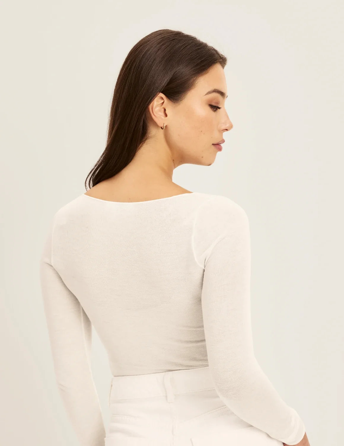Back view of model wearing the Cashmere Mist Boatneck Top highlighting the neckline and fit – Ivory – view 9 of 17