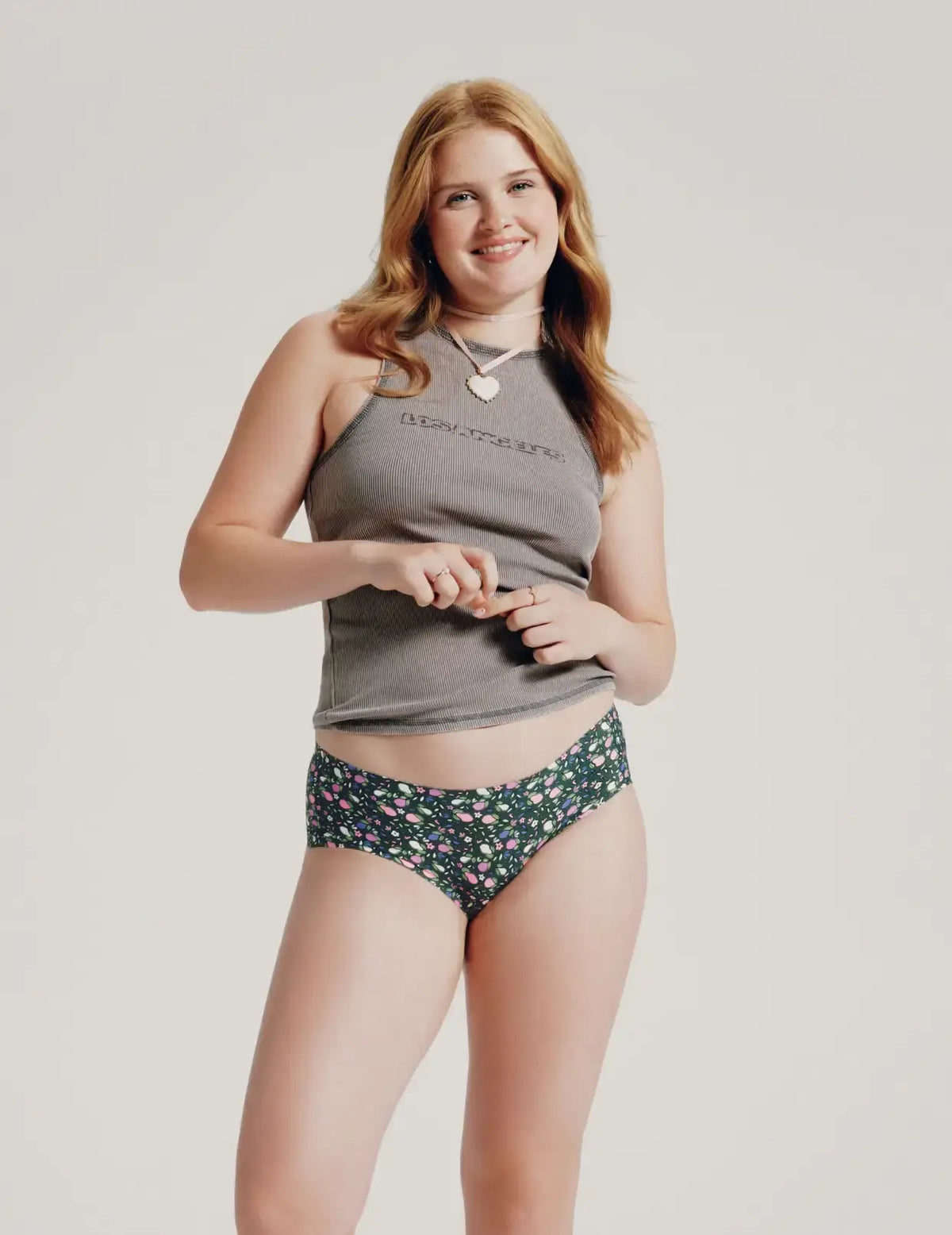 Front view of model wearing the Teen Leakproof UltraThin No-Show Boyshort highlighting the coverage and smooth fit – Perfect Pear – view 4 of 74