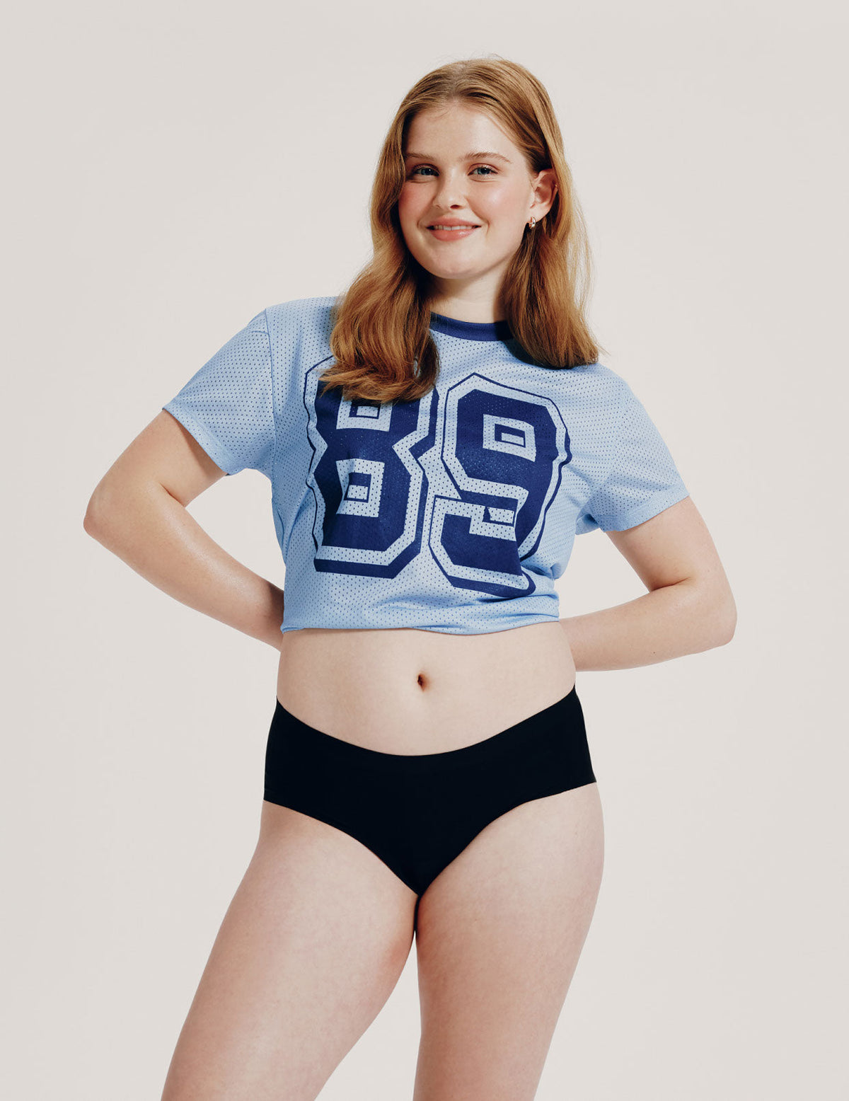 Front view of model wearing the Teen Leakproof UltraThin No-Show Boyshort highlighting the coverage and smooth fit – Black – view 1 of 65