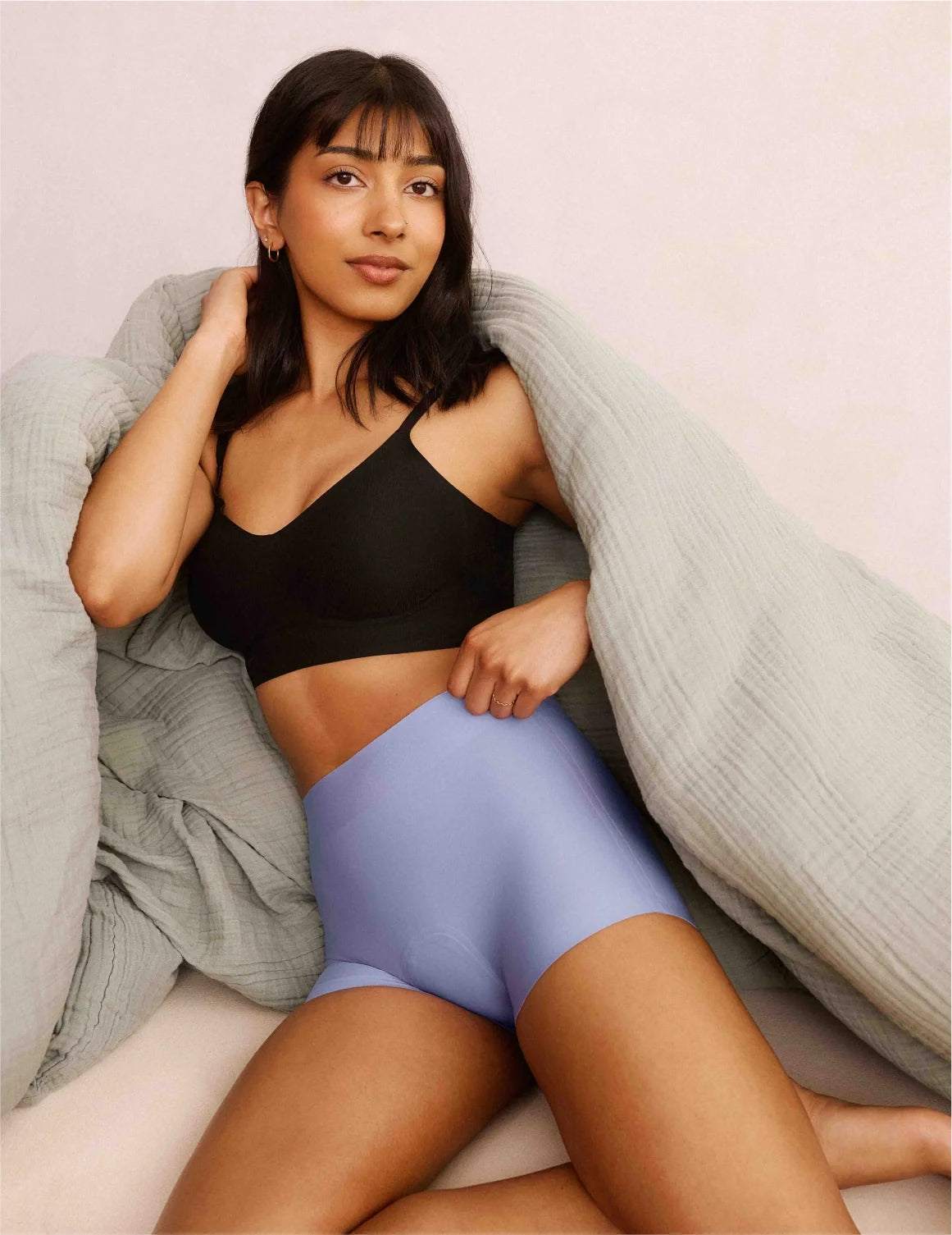 Front view of model wearing the Teen On-The-Daily Bra, highlighting the neckline, pullover design, and silhouette – Black – view 5 of 16