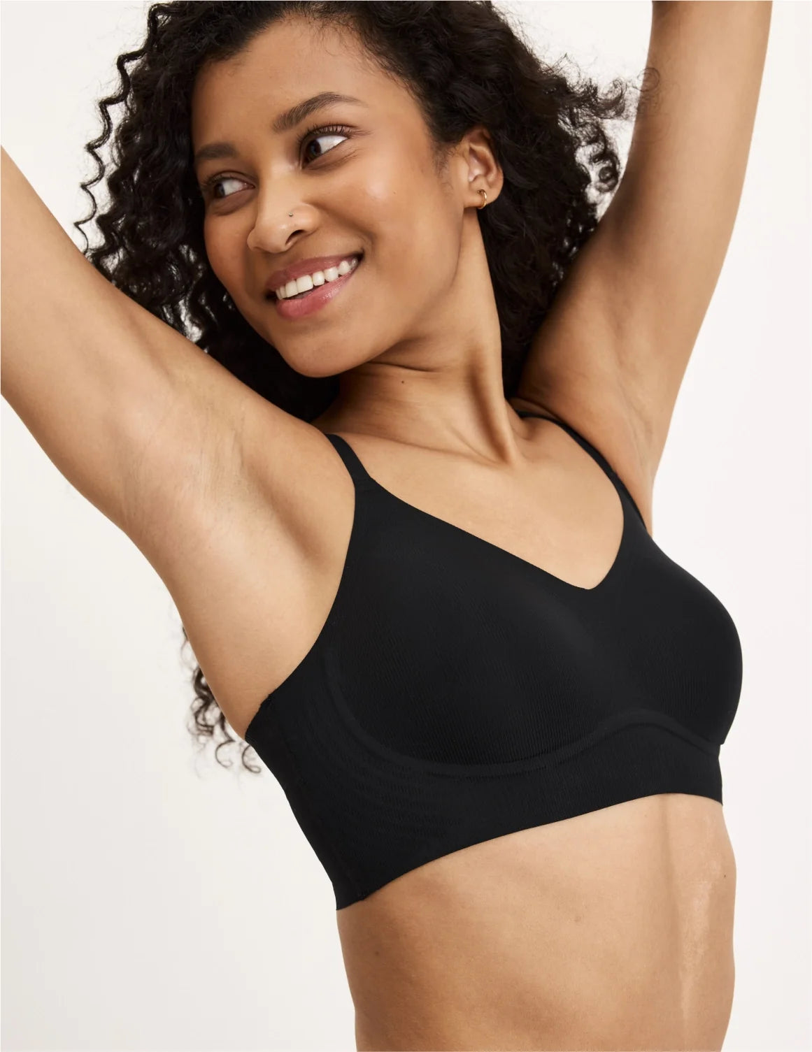 Front view of model wearing the Teen On-The-Daily Bra, highlighting the neckline, pullover design, and silhouette – Black – view 7 of 16