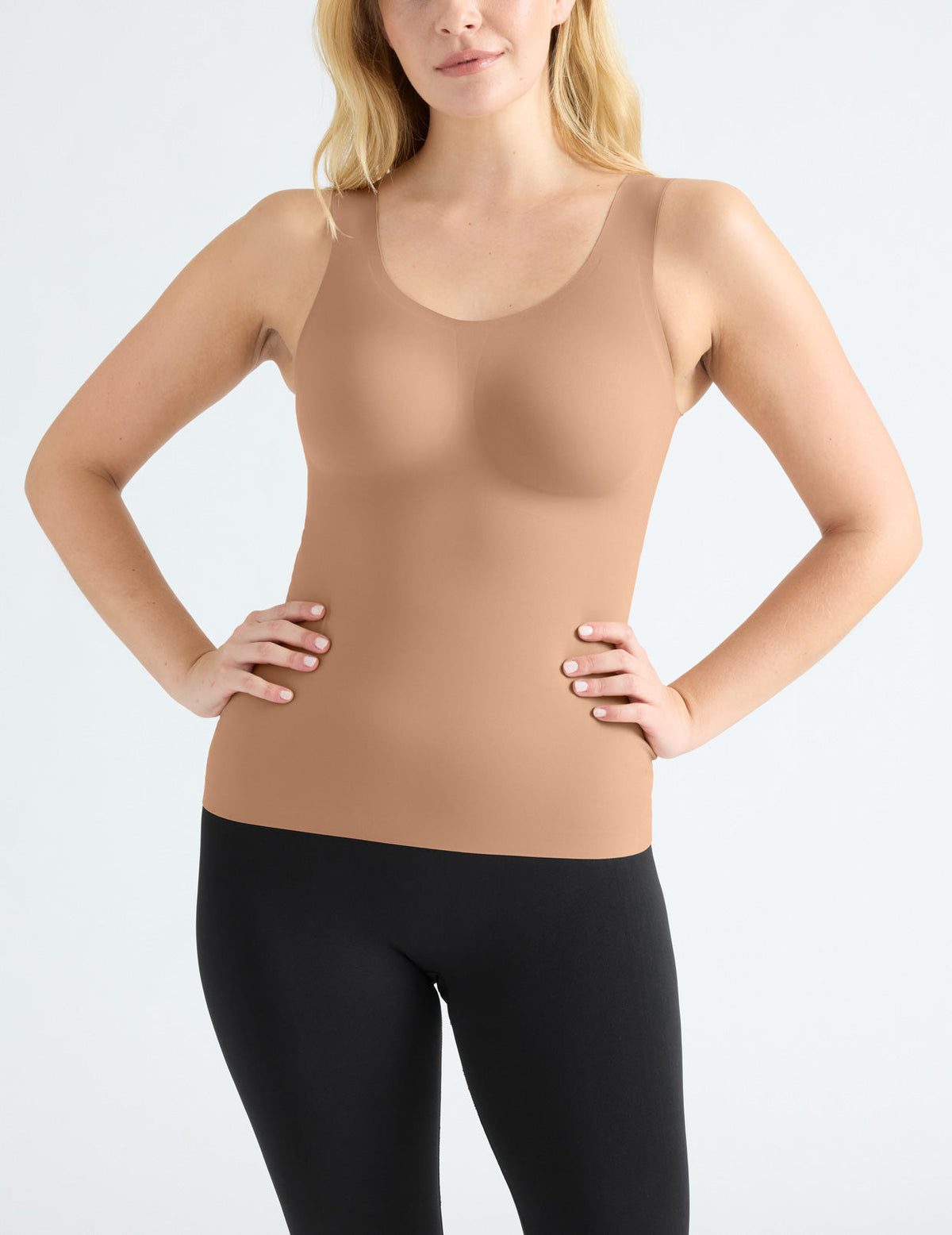 Front view of model wearing the LuxeLift Scoop Neck Tank, highlighting the neckline, strap design, and silhouette – Cavassa – view 4 of 20