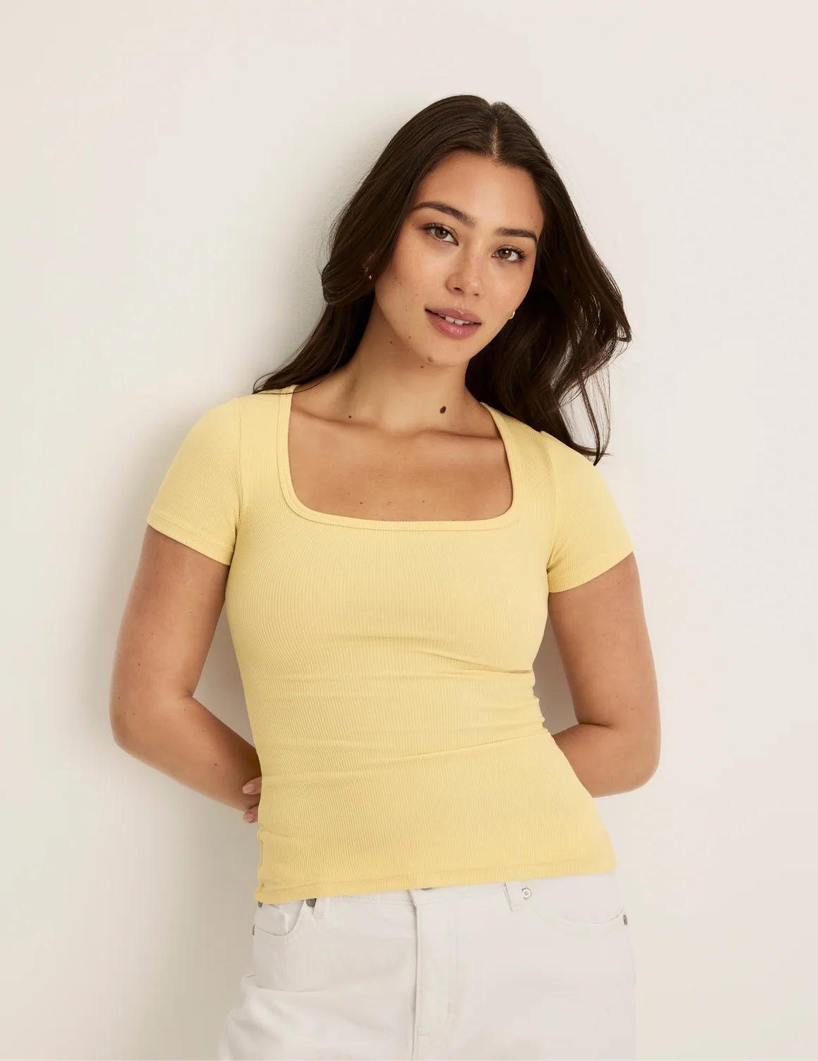 Front view of model wearing the SculptRib™ Cotton Scoop Neck T-Shirt highlighting the neckline, fabric and hugging fit – Buttercup – view 5 of 21