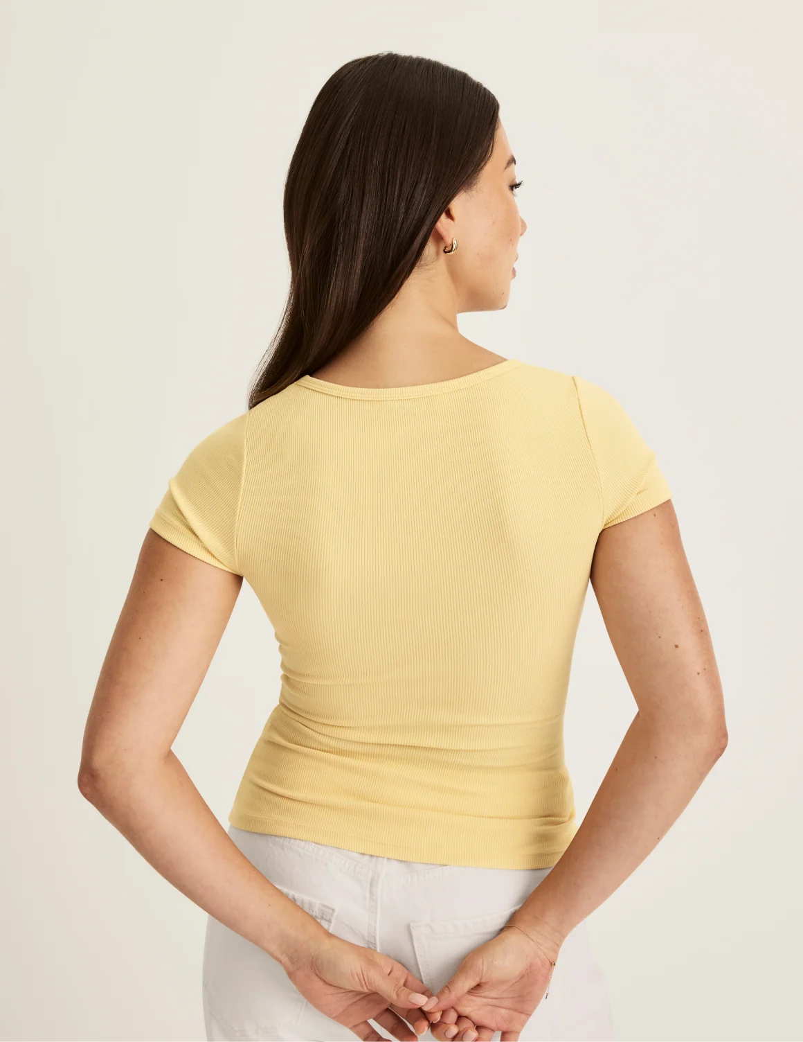 Back view of model wearing the SculptRib™ Cotton Scoop Neck T-Shirt highlighting the neckline, fabric and hugging fit – Buttercup – view 7 of 21
