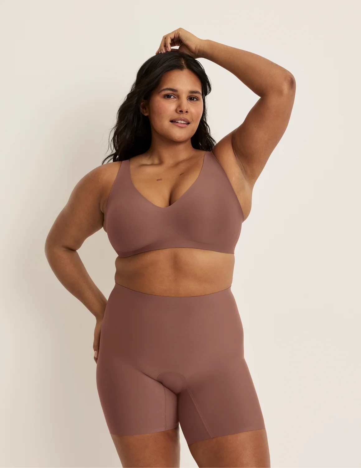 Full-body view of model wearing the Leakproof Contour Thigh Saver® 6”, highlighting the coverage and smooth fit – Sola – view 11 of 19