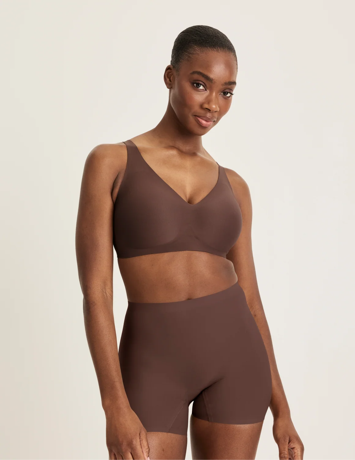 Full-body view of model wearing the Shortie Thigh Saver® 4”, highlighting the coverage and smooth fit – Sable – view 10 of 25