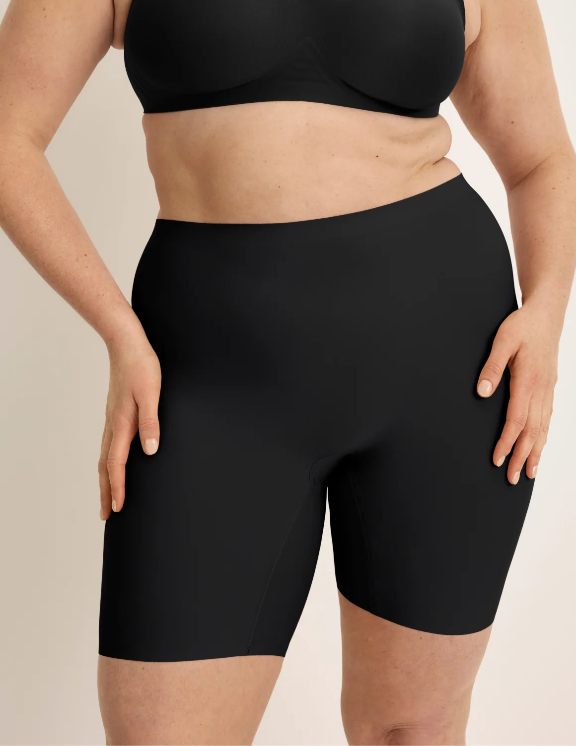 Front view of model wearing the Thigh Saver® 6” highlighting the coverage and smooth fit – Black – view 1 of 33