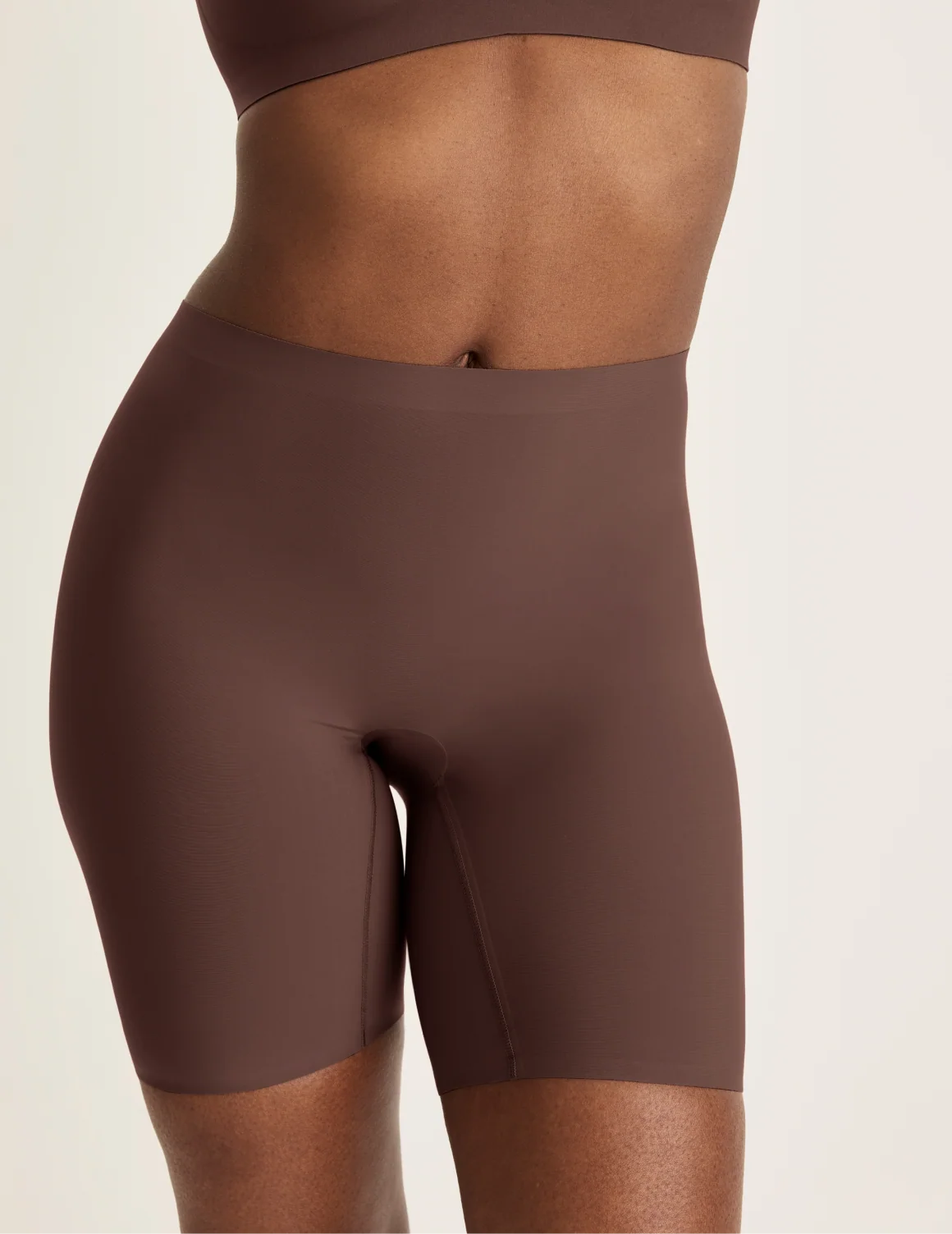 Front view of model wearing the Thigh Saver® 6” highlighting the coverage and smooth fit – Sable – view 11 of 33