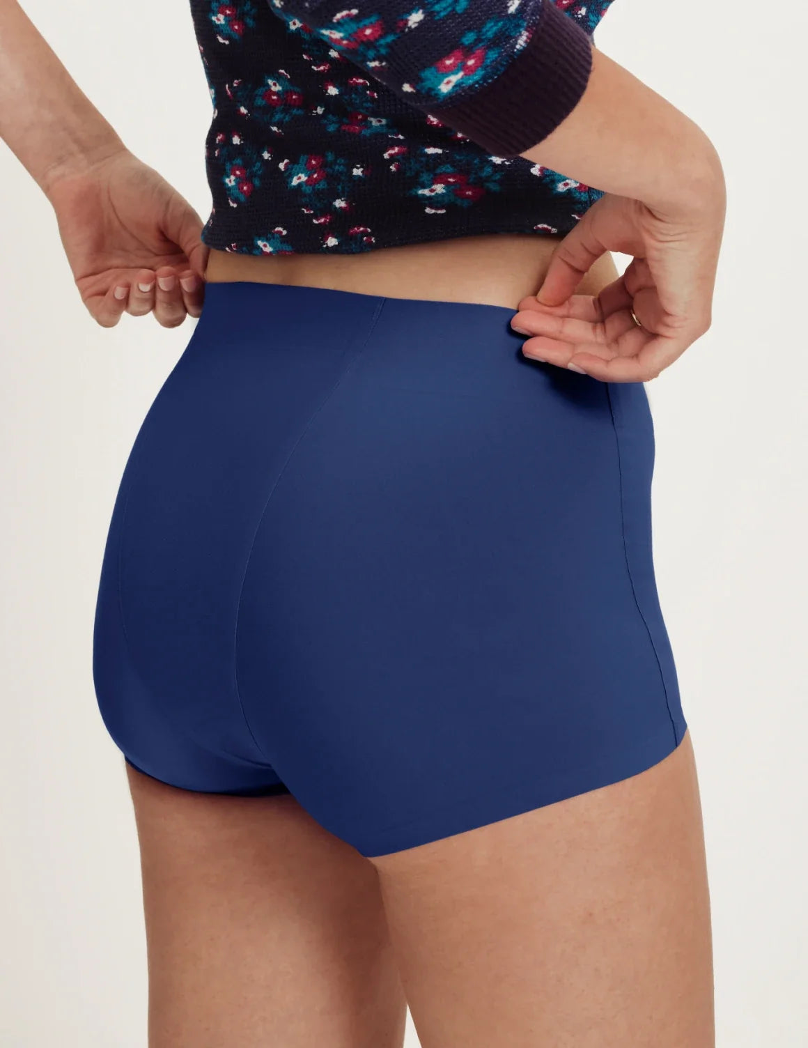 Front view of model wearing the Teen SuperPlus Leakproof® Sleepover Short highlighting the coverage and smooth fit – Night Sky – view 8 of 18