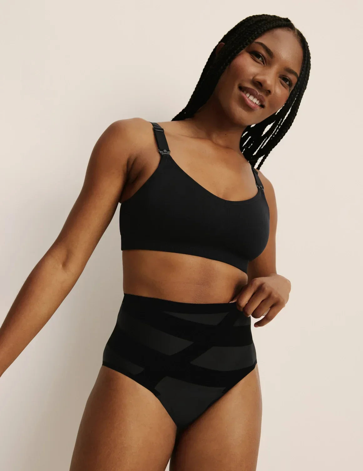 Full-body view of model wearing the Leakproof CoreLove High Rise, highlighting the coverage and hugging fit – Black – view 4 of 8