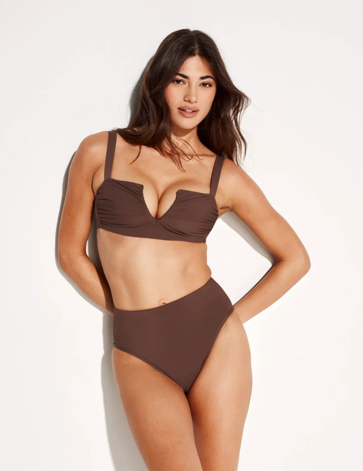 Front view of model wearing the Leakproof Sculpt High Rise Bikini Swim Bottom highlighting the coverage and fit – Espresso – view 4 of 21