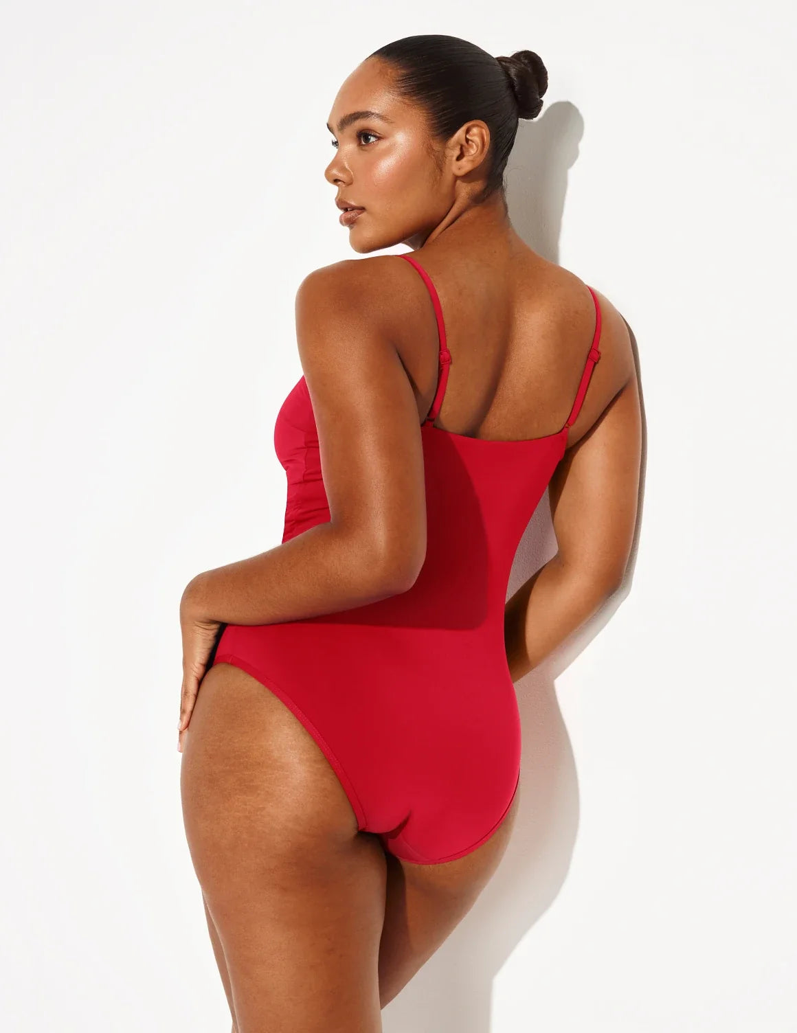 Back view of model wearing the Leakproof Sculpt Classic One Piece Swimsuit highlighting the neckline, coverage and fit – Cherry – view 9 of 22